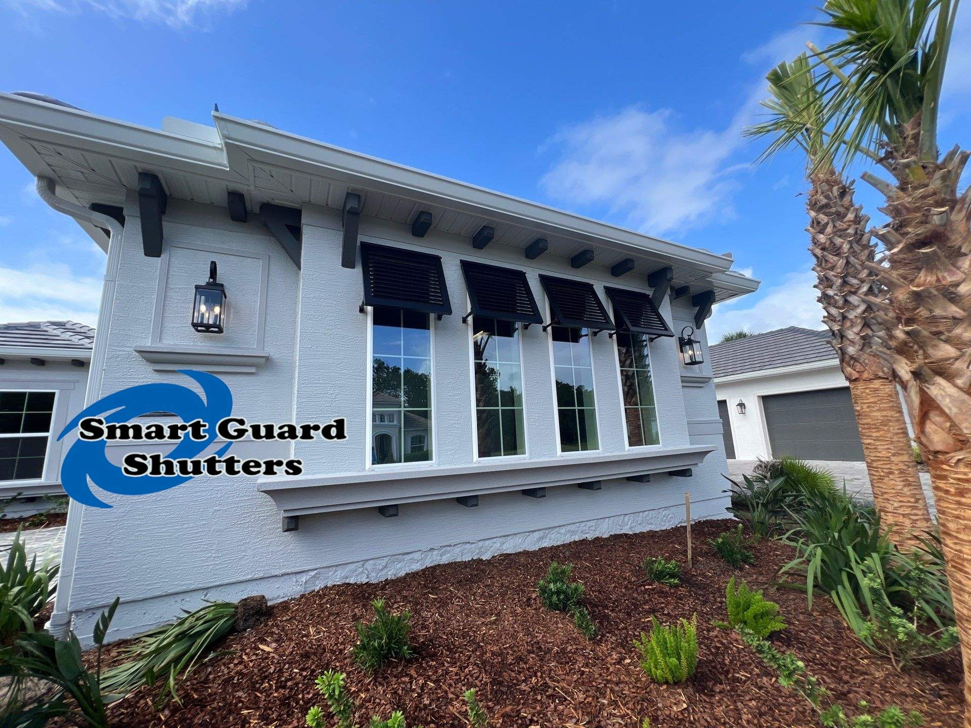 Decorative Bahamas in Dark Anodized Bronze by Smart Guard Shutters