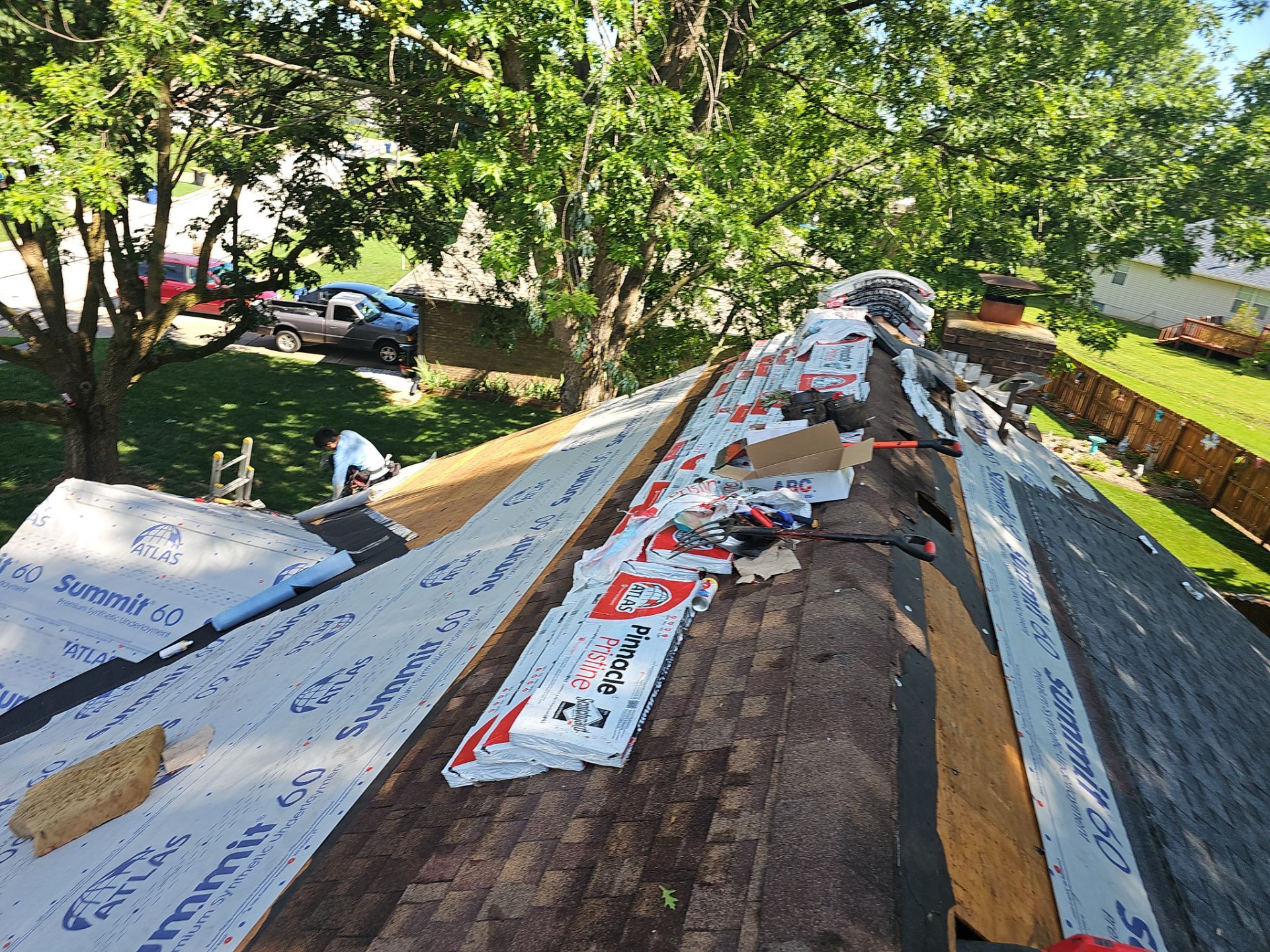 Residential Roof + Gutters & Downspouts Install  by Titan Commercial & Residential Roofing 