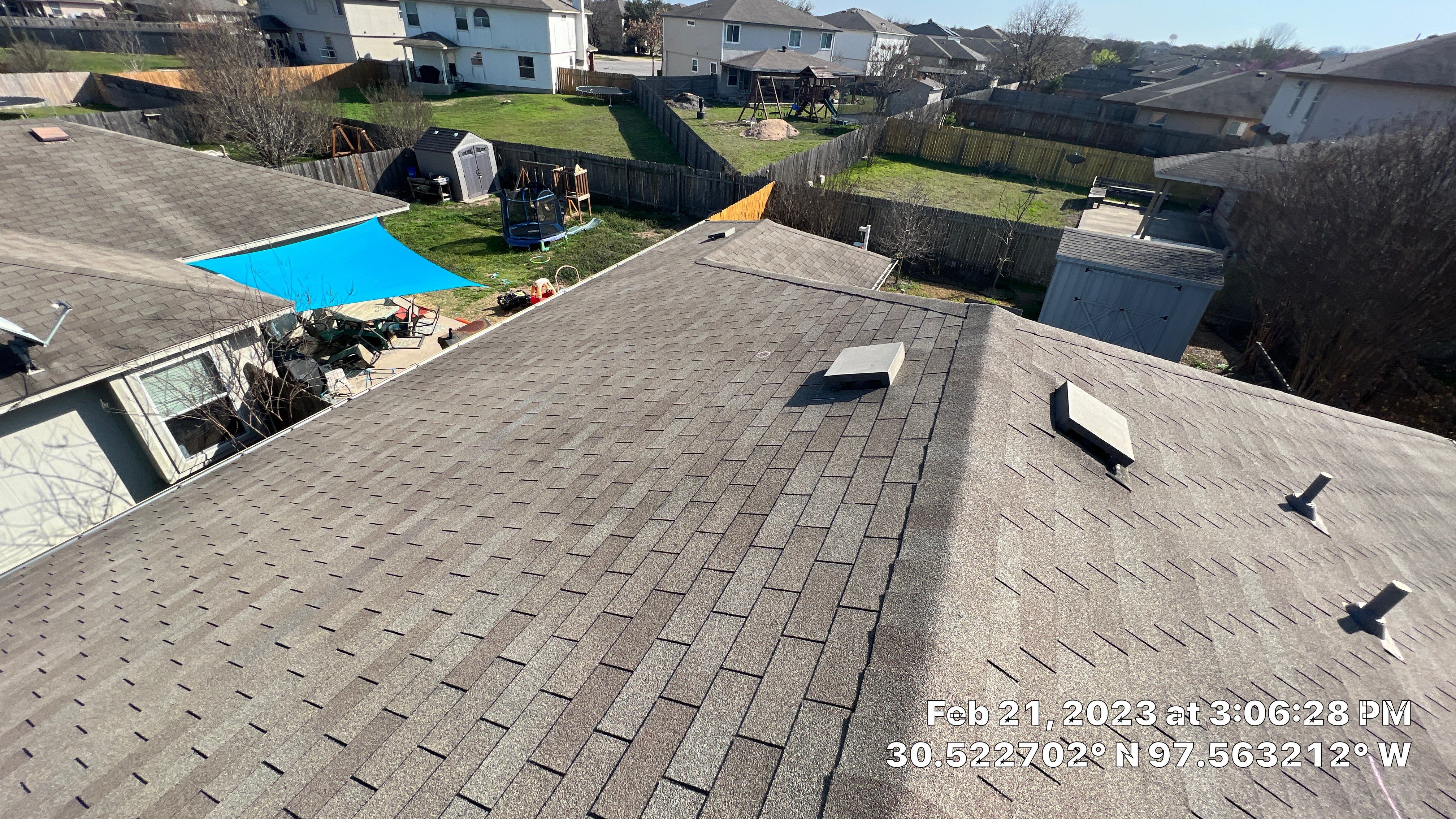 Residential Roof Replacement and Gutter System Upgrade in Hutto by Caliber Restoration LLC