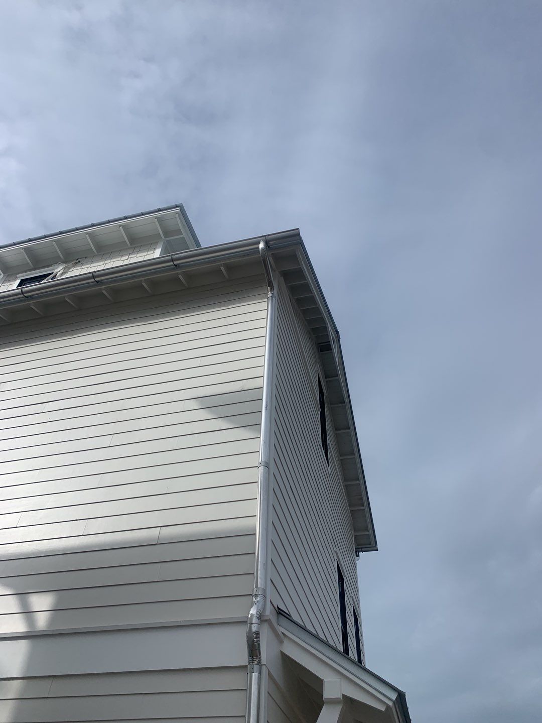 Half-Round Gutters in Galvalume Color in Santa Rosa Beach FL by Gutter Professors