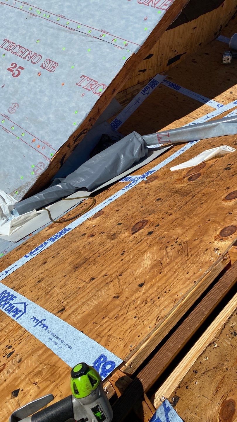 Residential Roofing Installation using Roof Replacement by American Roofing & Construction LLC