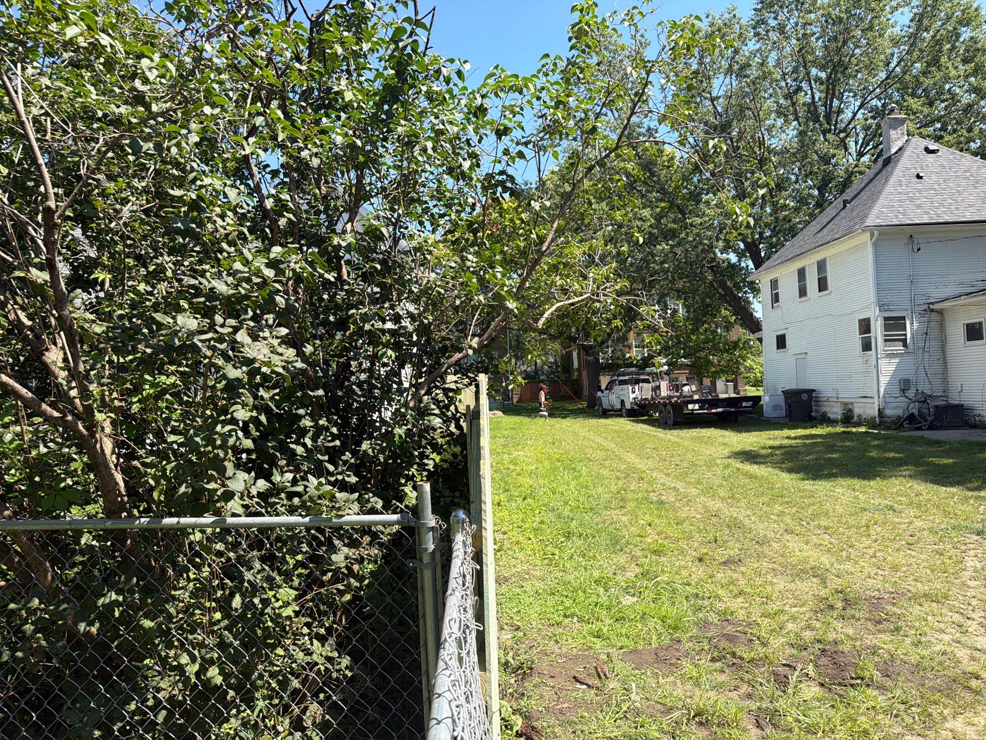 Pressure-Treated Wood Privacy Fence Installation in Waterloo by Perfect Picket Fence and Stain