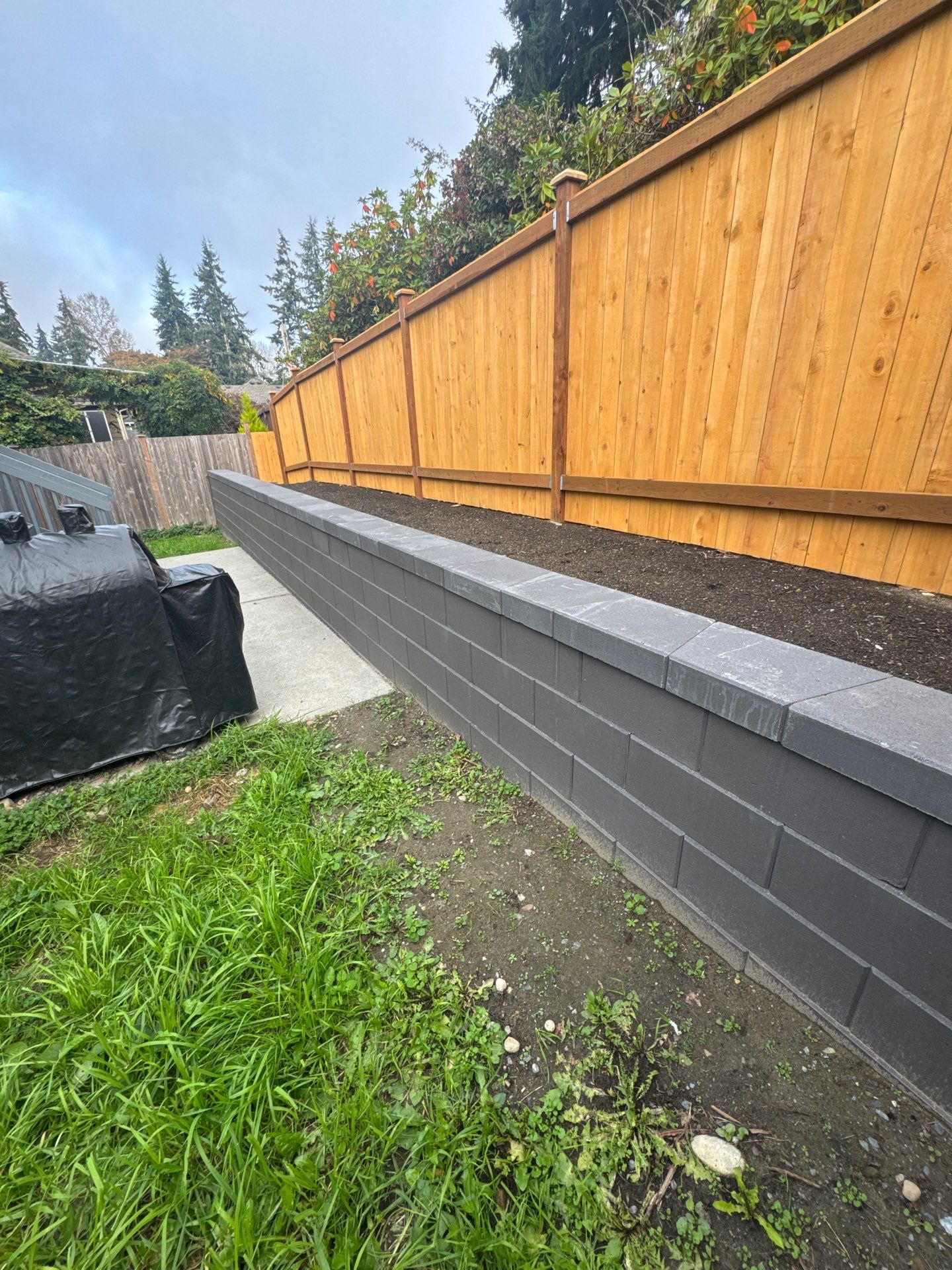 Jireh Outdoor Projects | Retaining Wall & Fence Build by Jireh Asphalt & Concrete Inc 