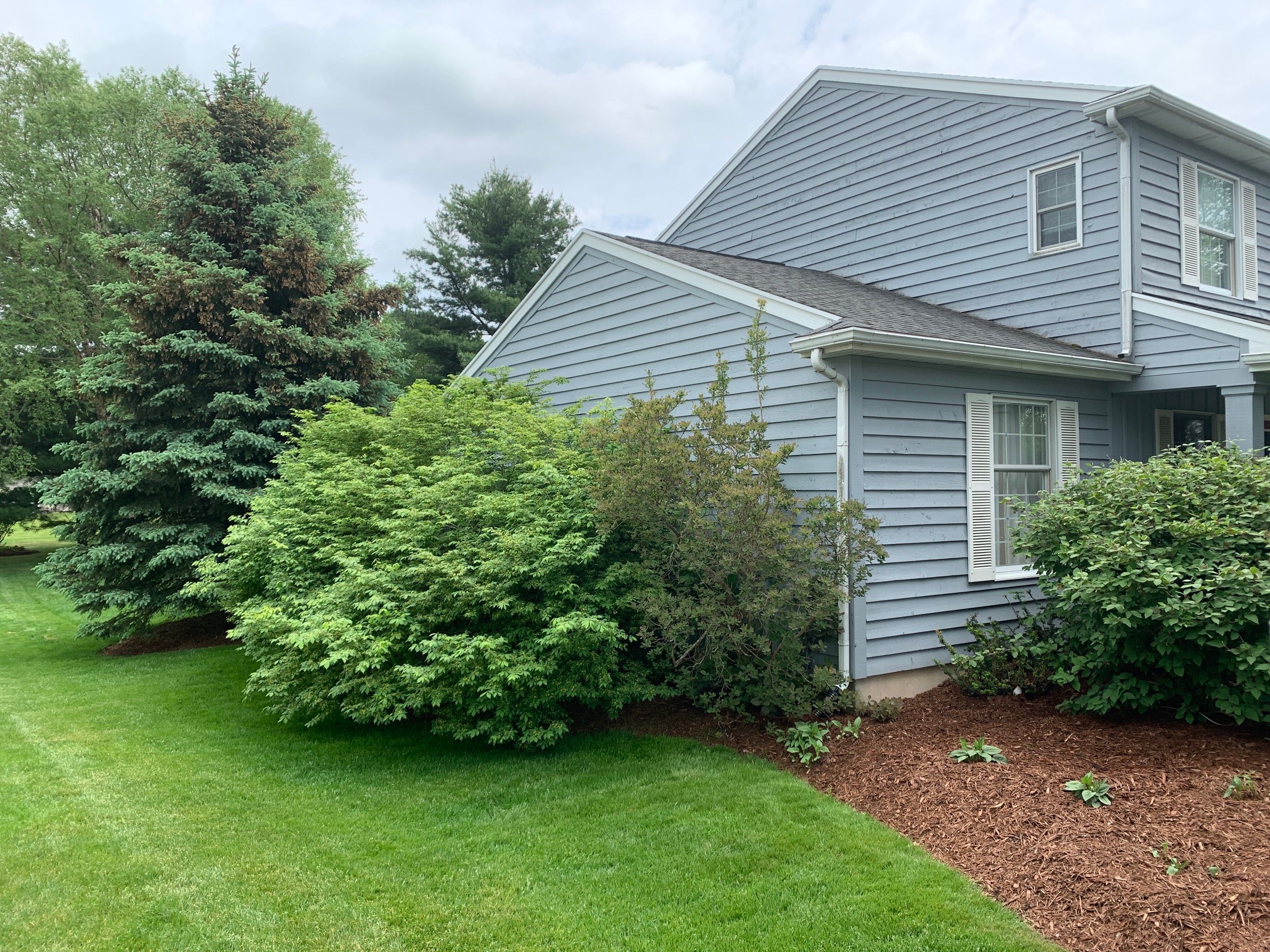Complete Roof and Siding Installation in Haslett by Acme Exteriors