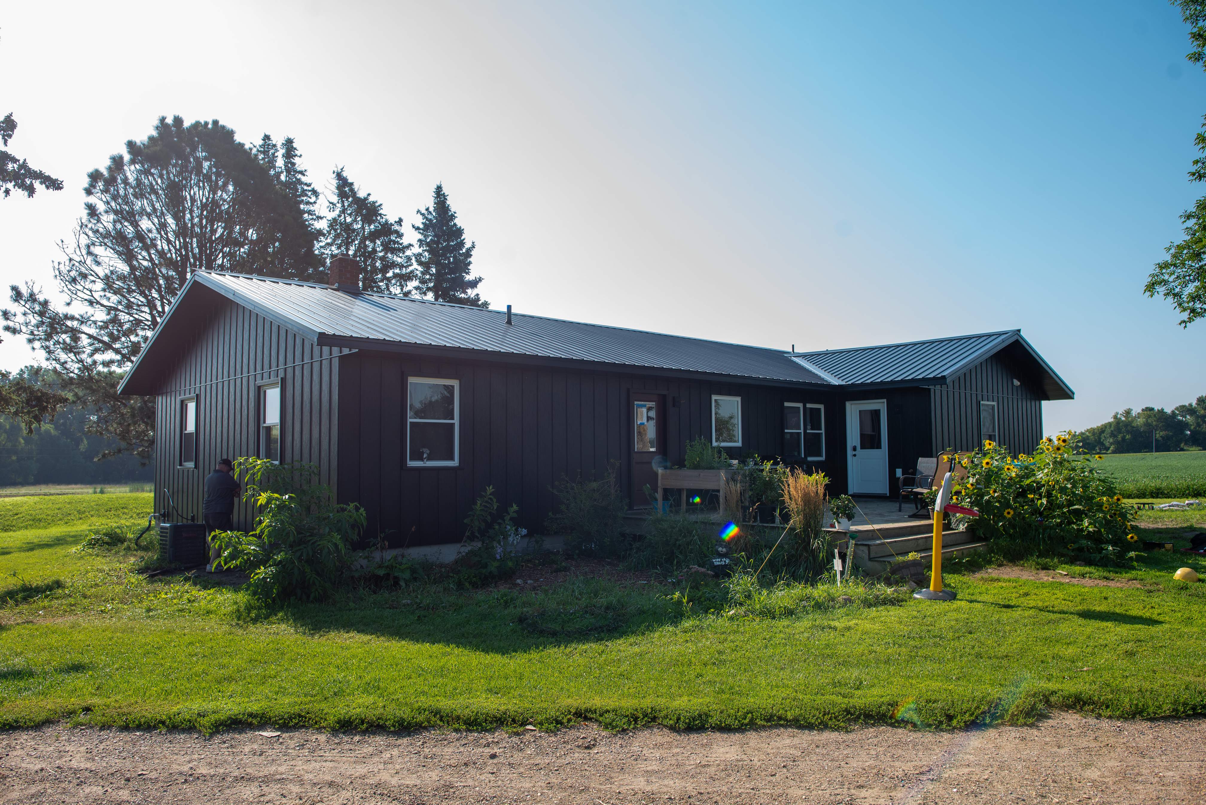 EDCO Steel Siding with Black Fascia & Soffit – Waverly, MN by Next Level Seamless Gutters / Exteriors Inc.