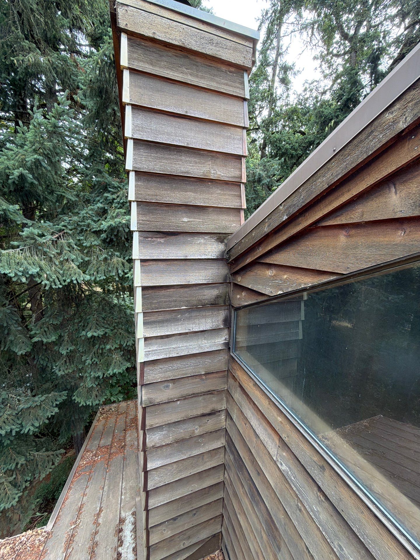 Cedar Siding Replacement on the Chimney by Handyman State LLC