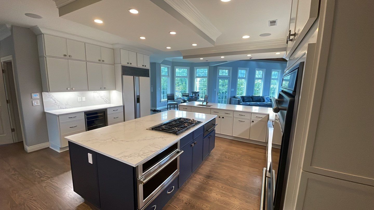 Kitchen Remodel using Fabuwood Luna Dove and Indigo Cabinetry by HomeWerkes Design & Build