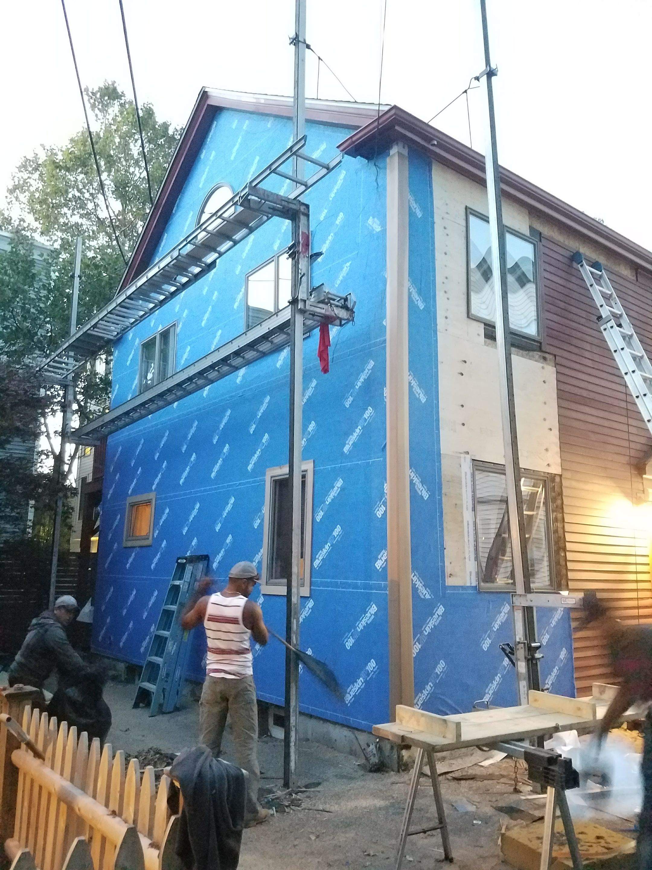 Siding Installation using Cedar Clapboard by Loyalty Exterior Solutions 