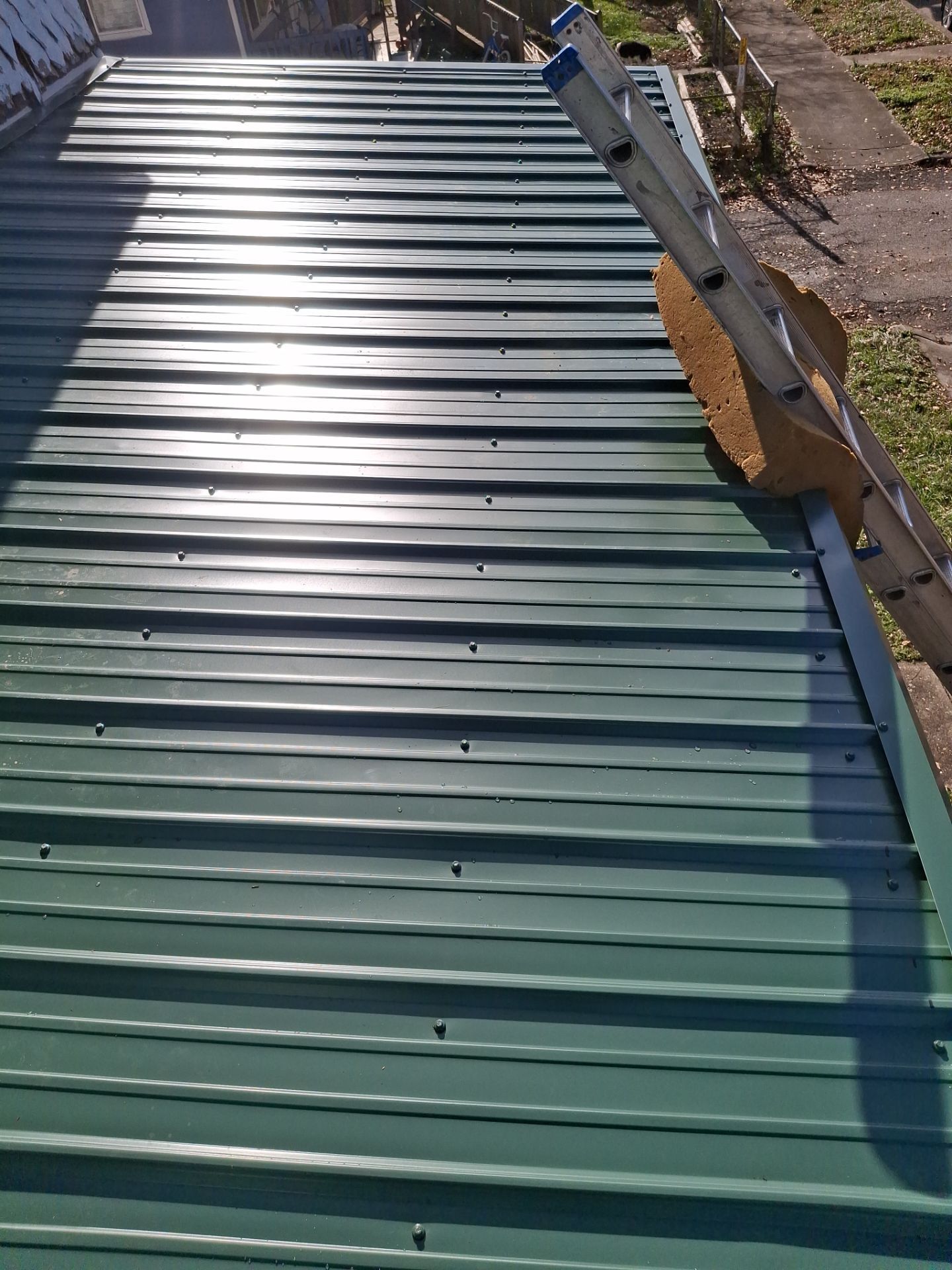Residential Roofing Installation using Metal by Rainstoppers Roofing