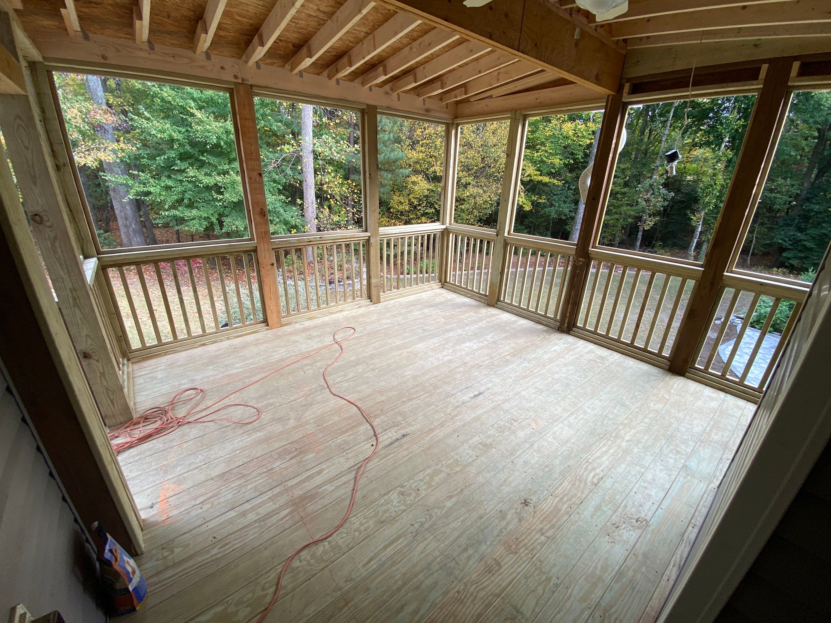 Elevated Screened Porch Addition and Deck Integration in Knightdale by The Remodeling Company