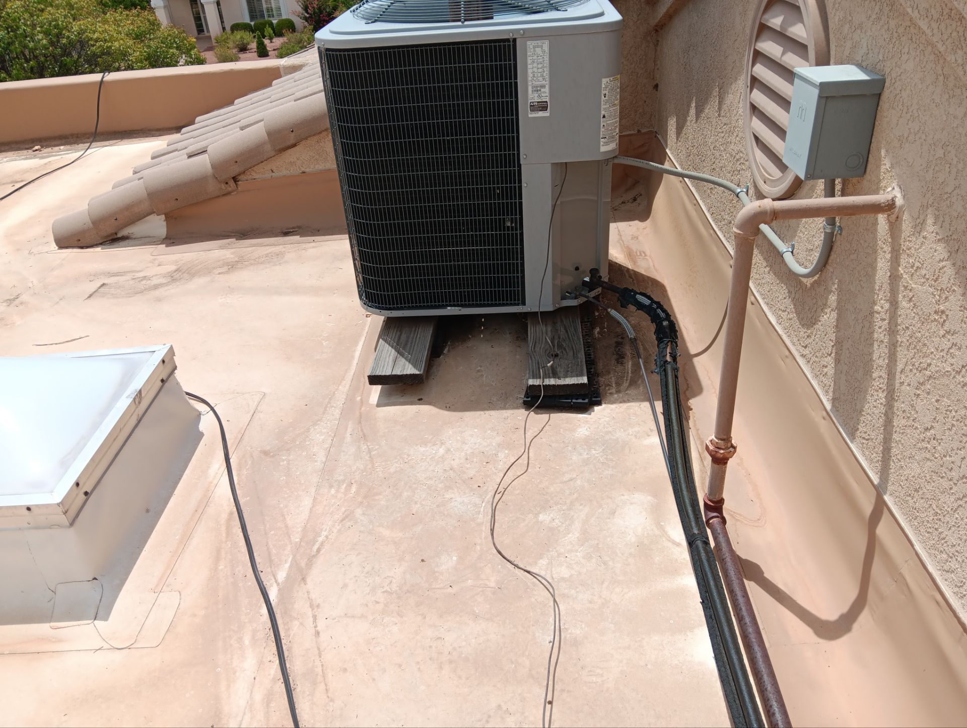Tile and TPO Roof Maintenance and Gutter Cleaning in Sandia Heights by Doyle Roof Masters Inc