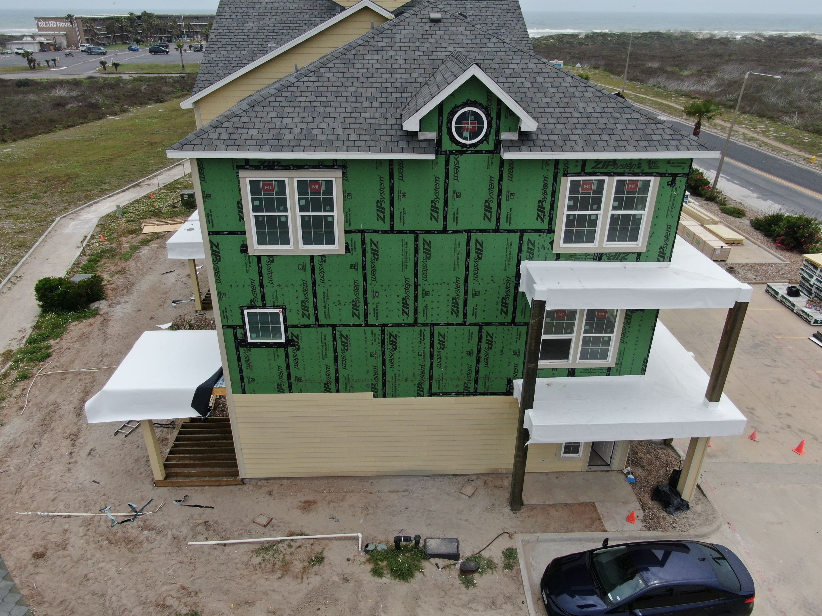 Walk Out Patio Cover by Bayfront Roofing and Construction