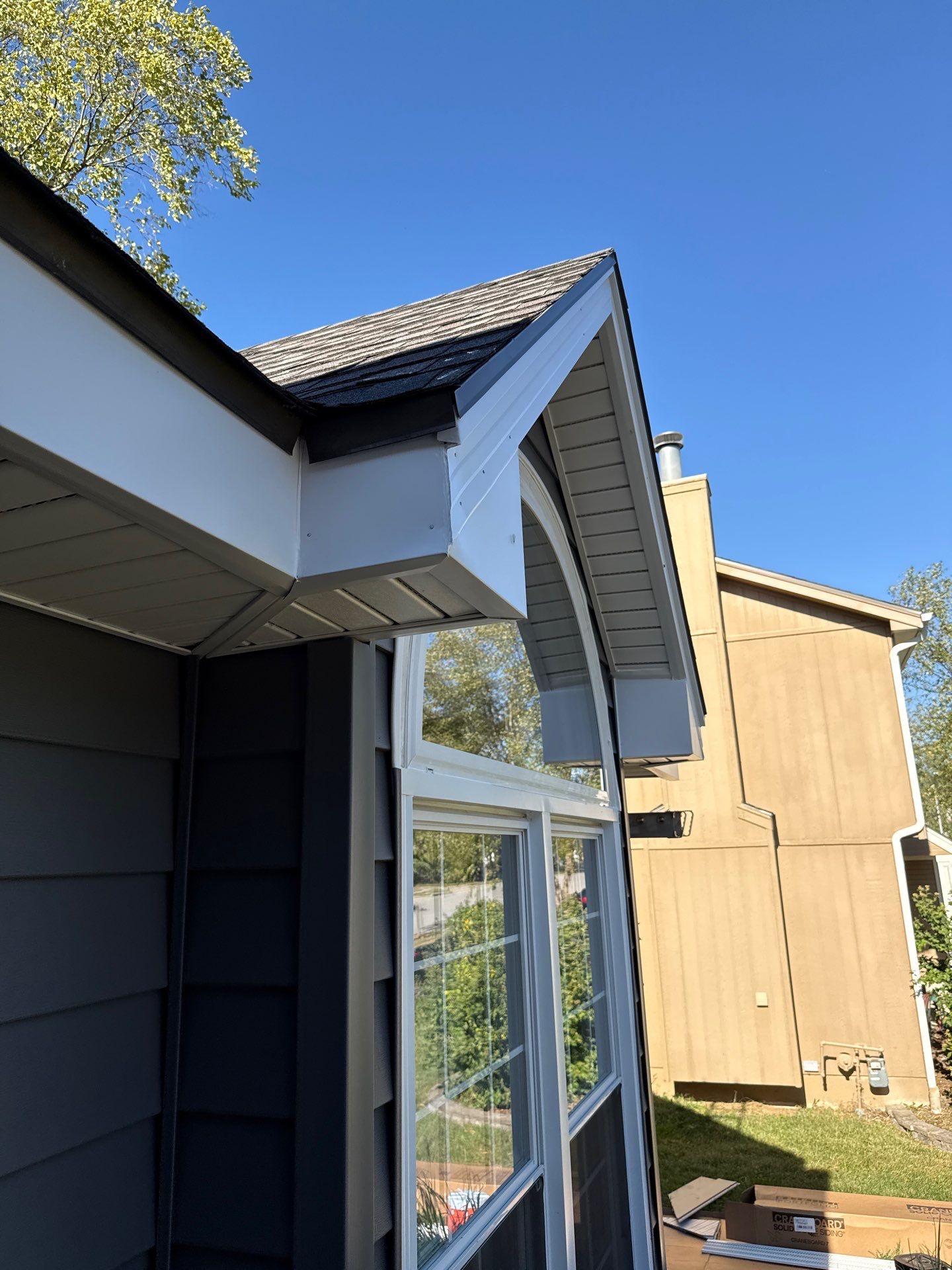 Split Entry in Smokey Ash Craneboard D7 by EEC  Windows, Siding & Roofing 