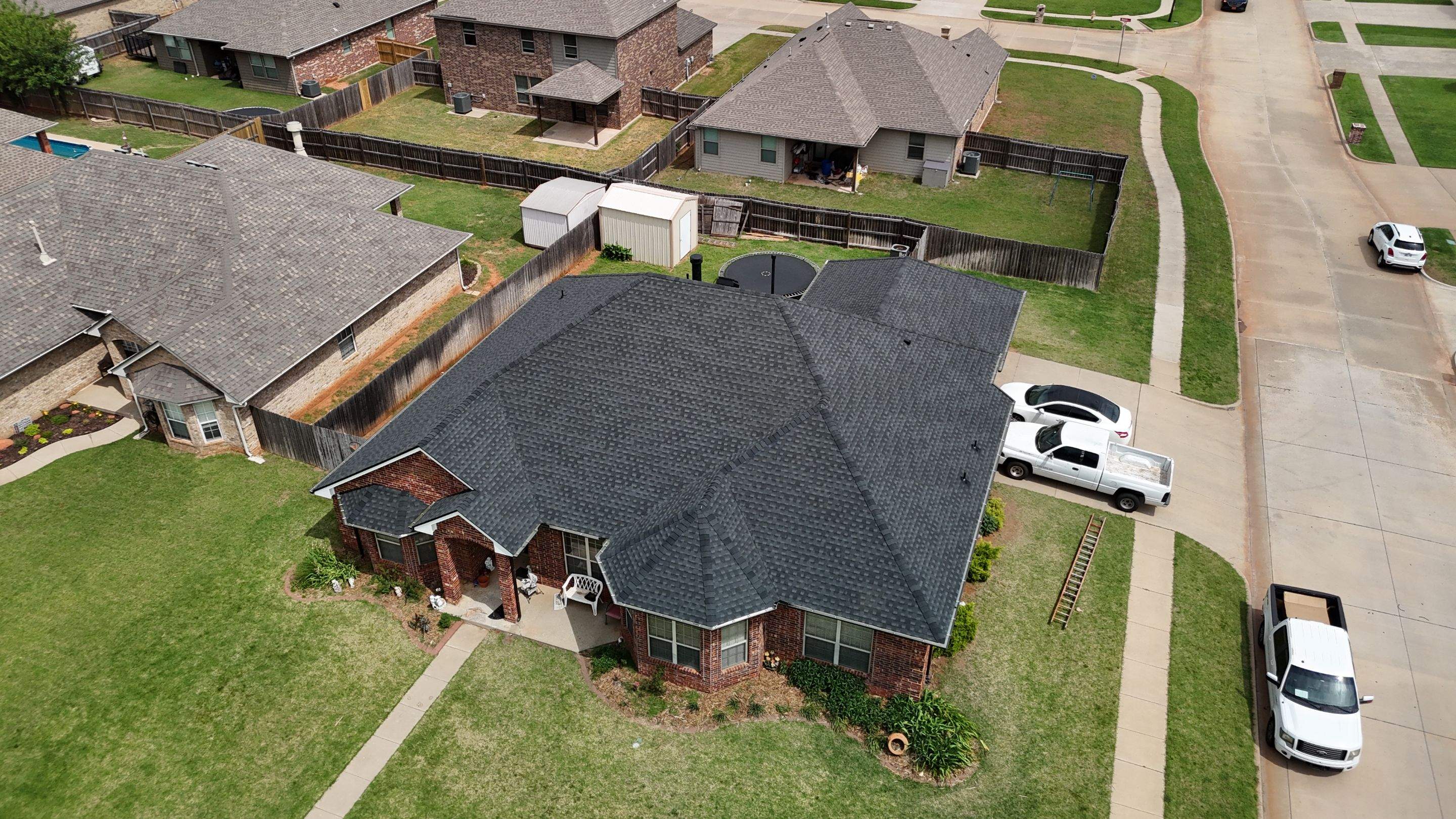 Roof Replacement in Mustang, OK by 5Coat Roofing & Construction
