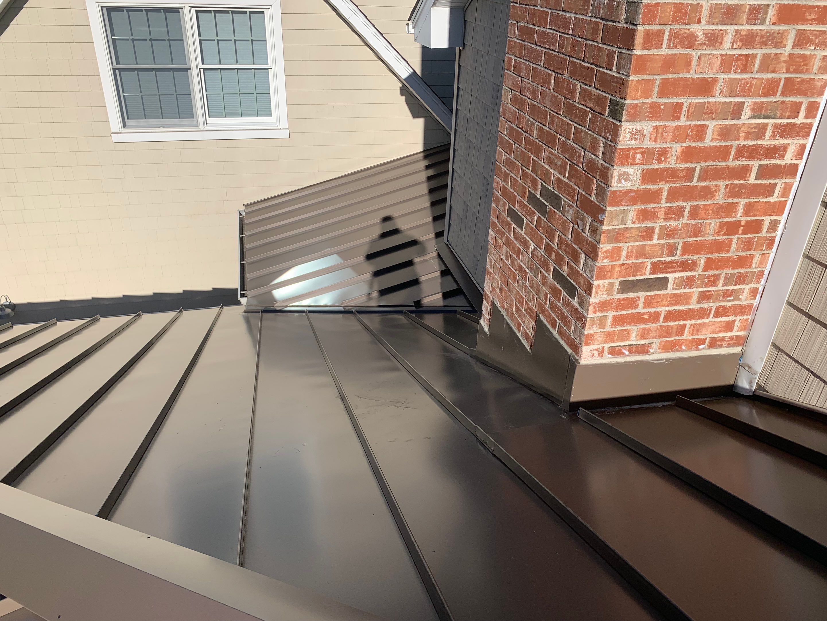 Asphalt & Standing Seam Metal Roof Replacement  by Lecla Home Improvements and Roofing INC