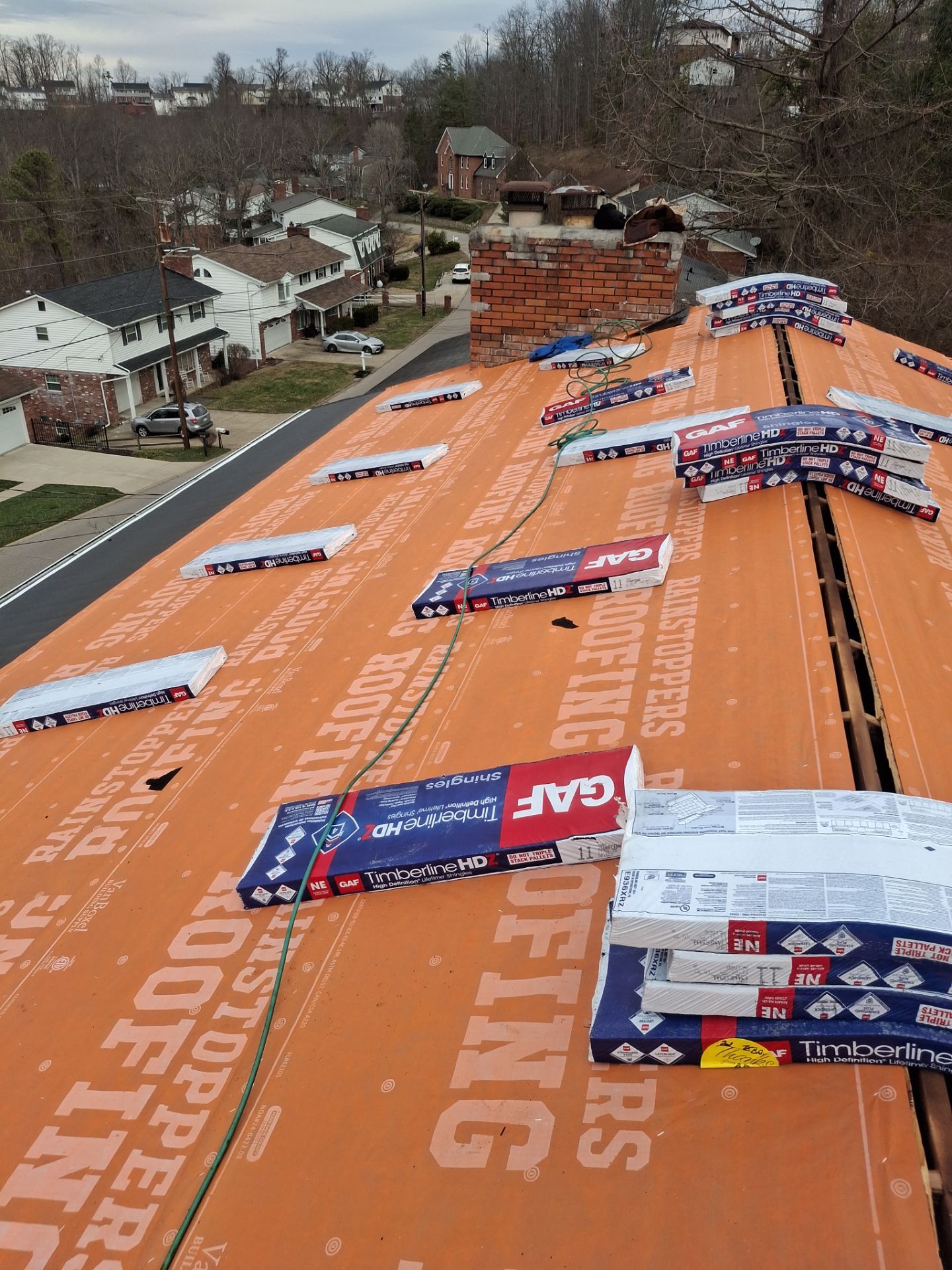 Residential Roofing Installation using GAF Timberline HDZ Charcoal by Rainstoppers Roofing