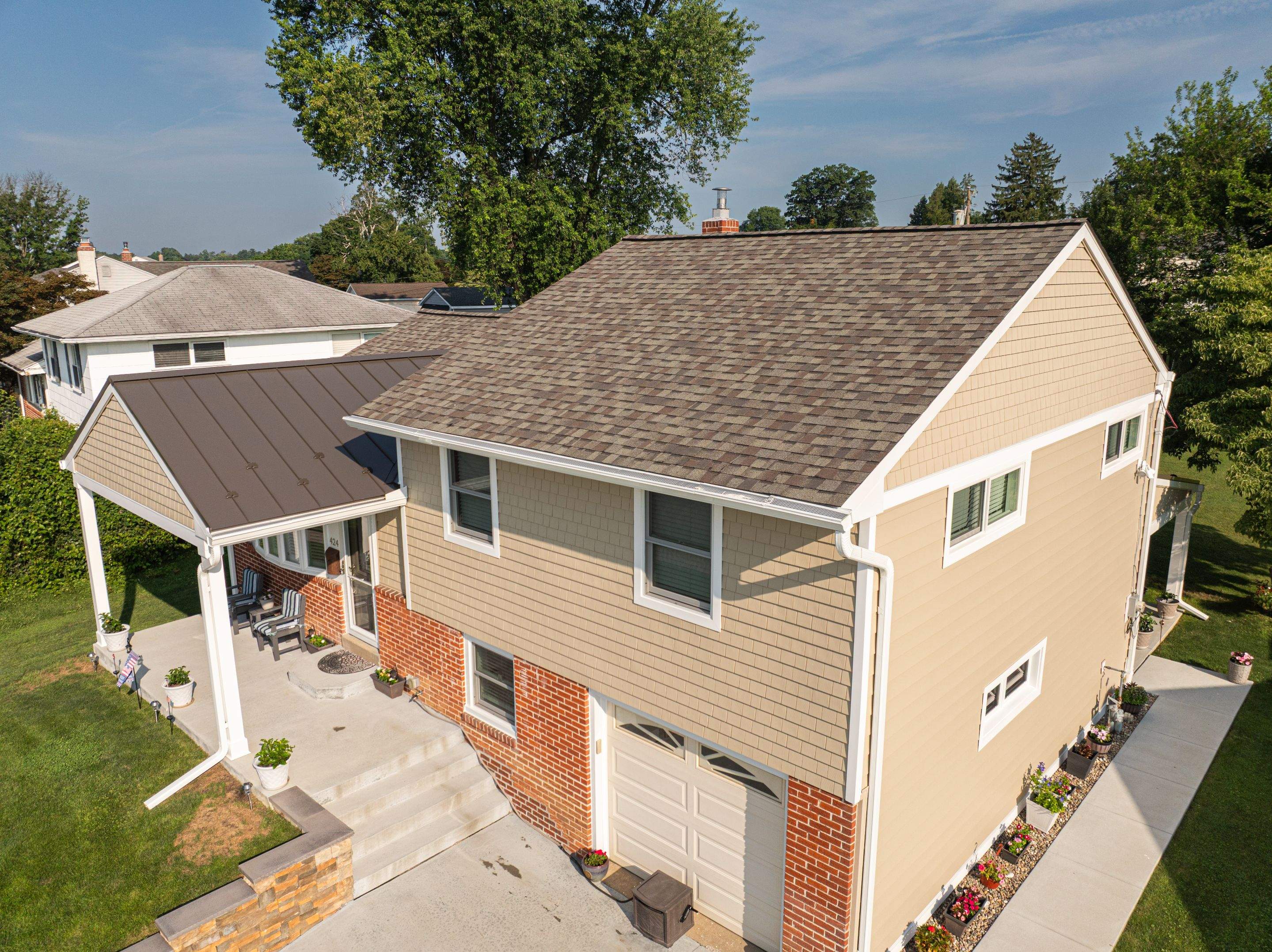 Portico Installments, Roof Replacements, and Siding Replacements by O'Donnell Roofing Company