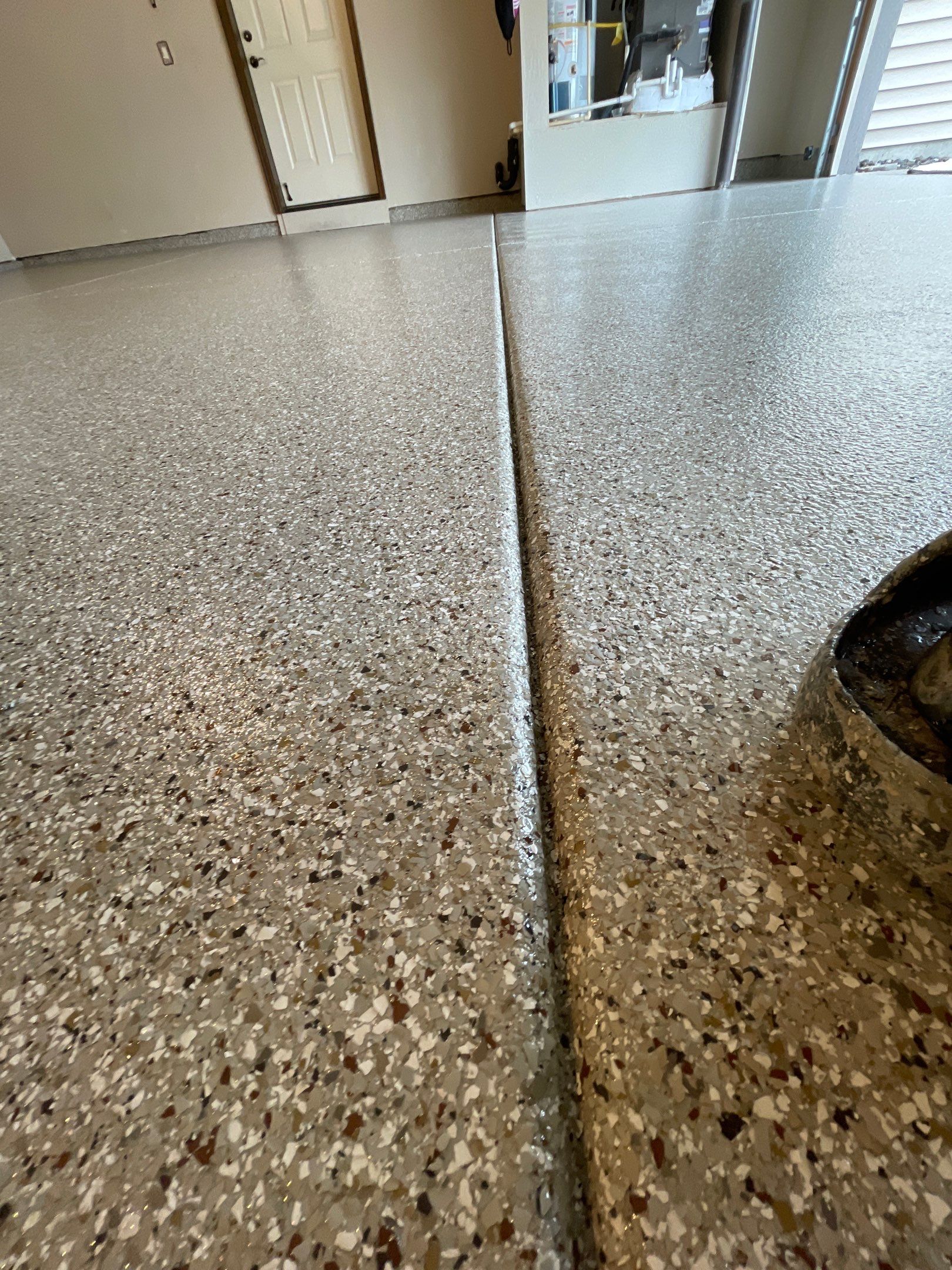 Garage Transformation using Pebble Beach and Front Porch using Greystone by Croc Coatings, LLC