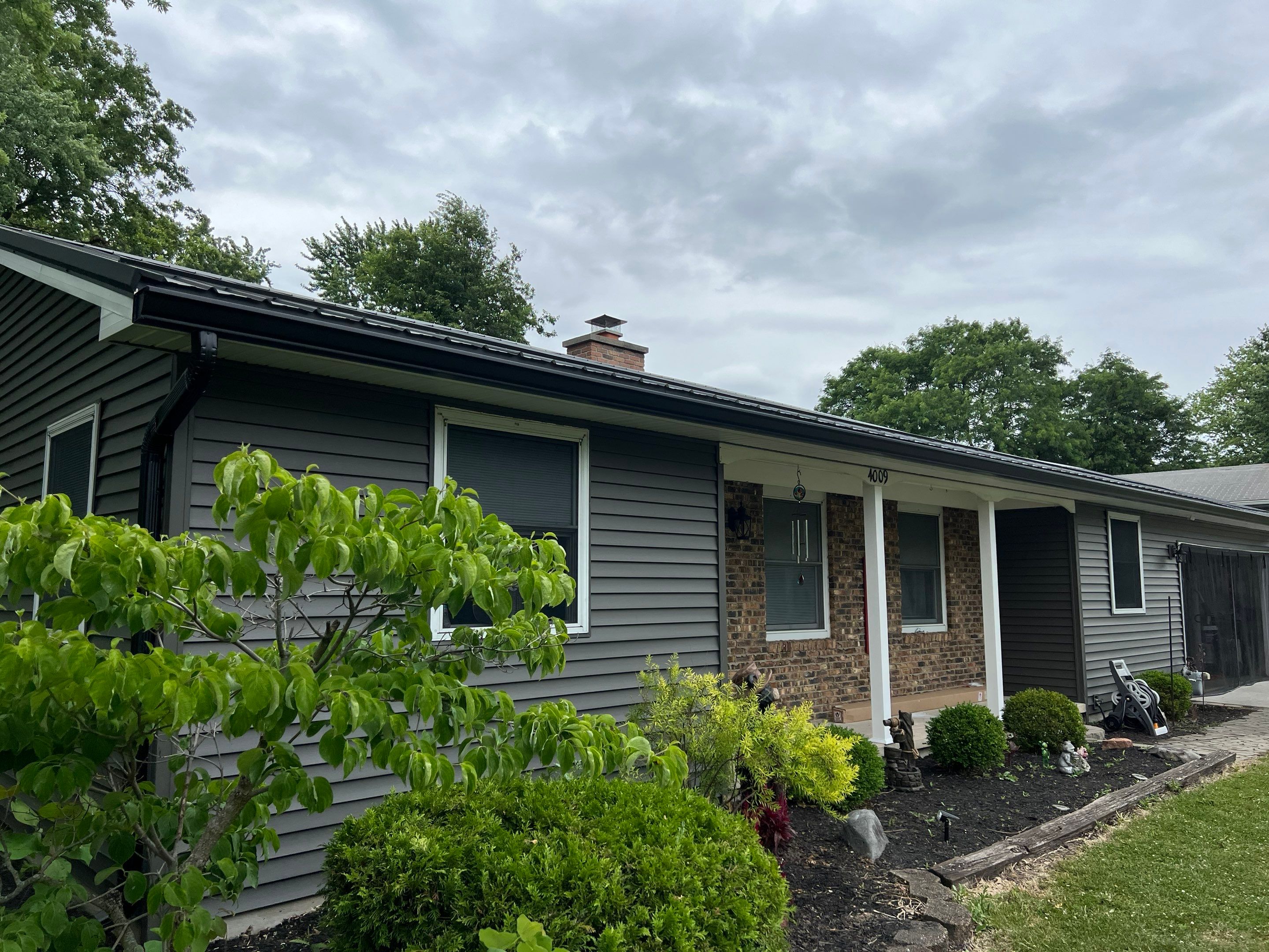 Complete Exterior Transformation - Exposed Fastener Roofing System by 4Ever Metal Roofing