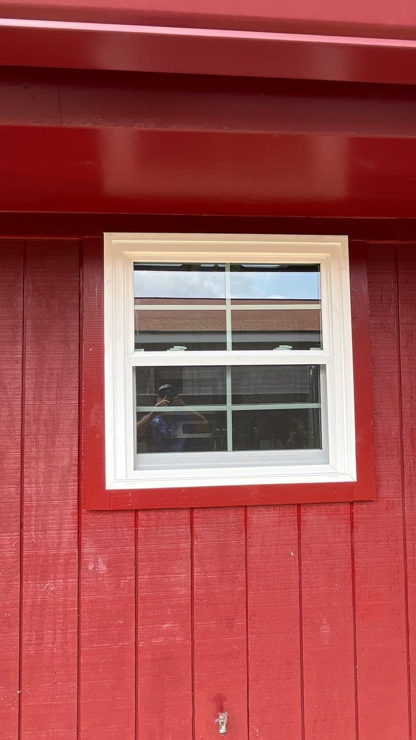 Black and white and red all over by Bayfront Roofing and Construction