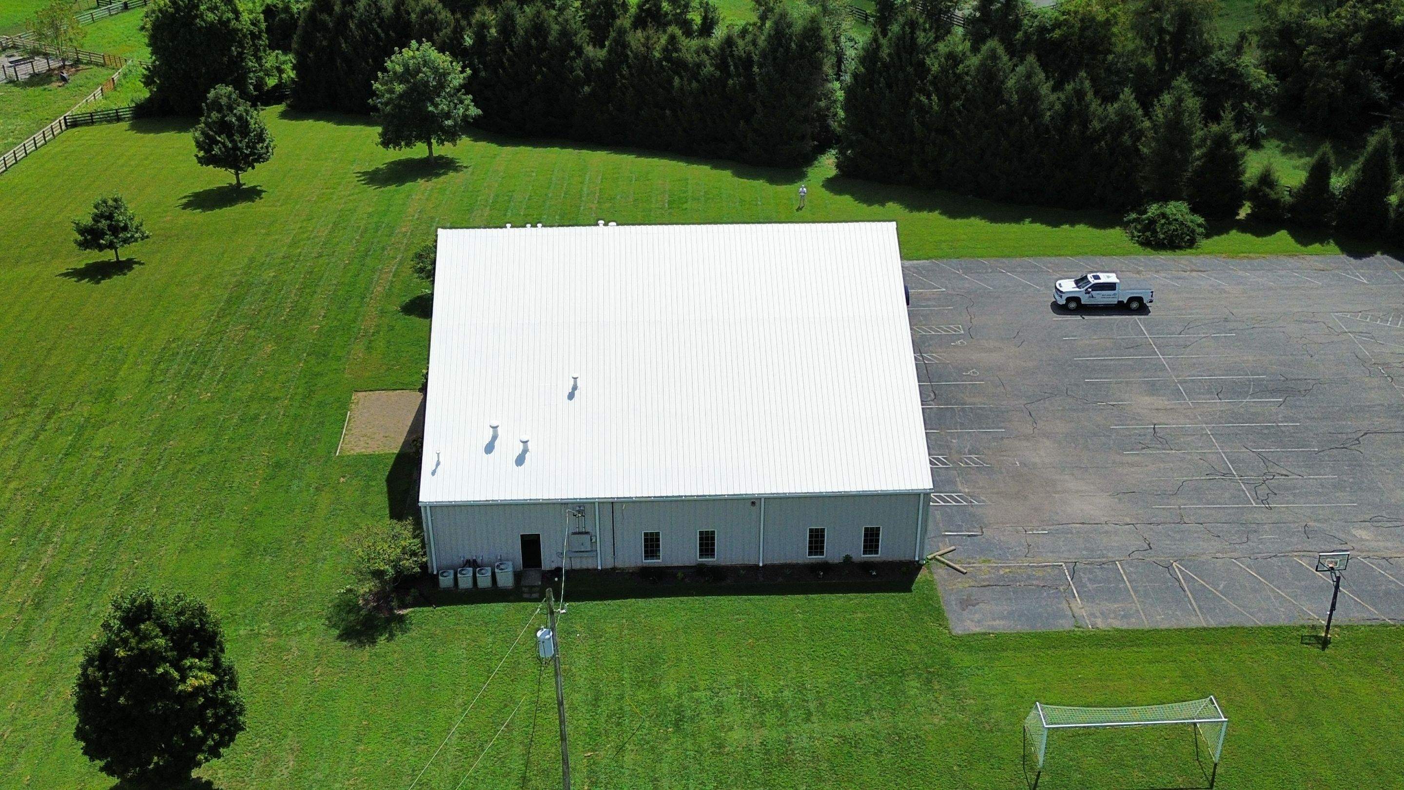 Metal Roof Restoration by Commercial Roofing Pros