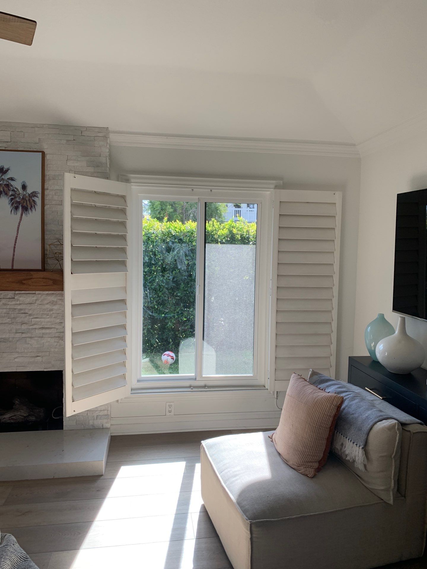 Window Installation using Milgard black vinyl windows by American Window Company