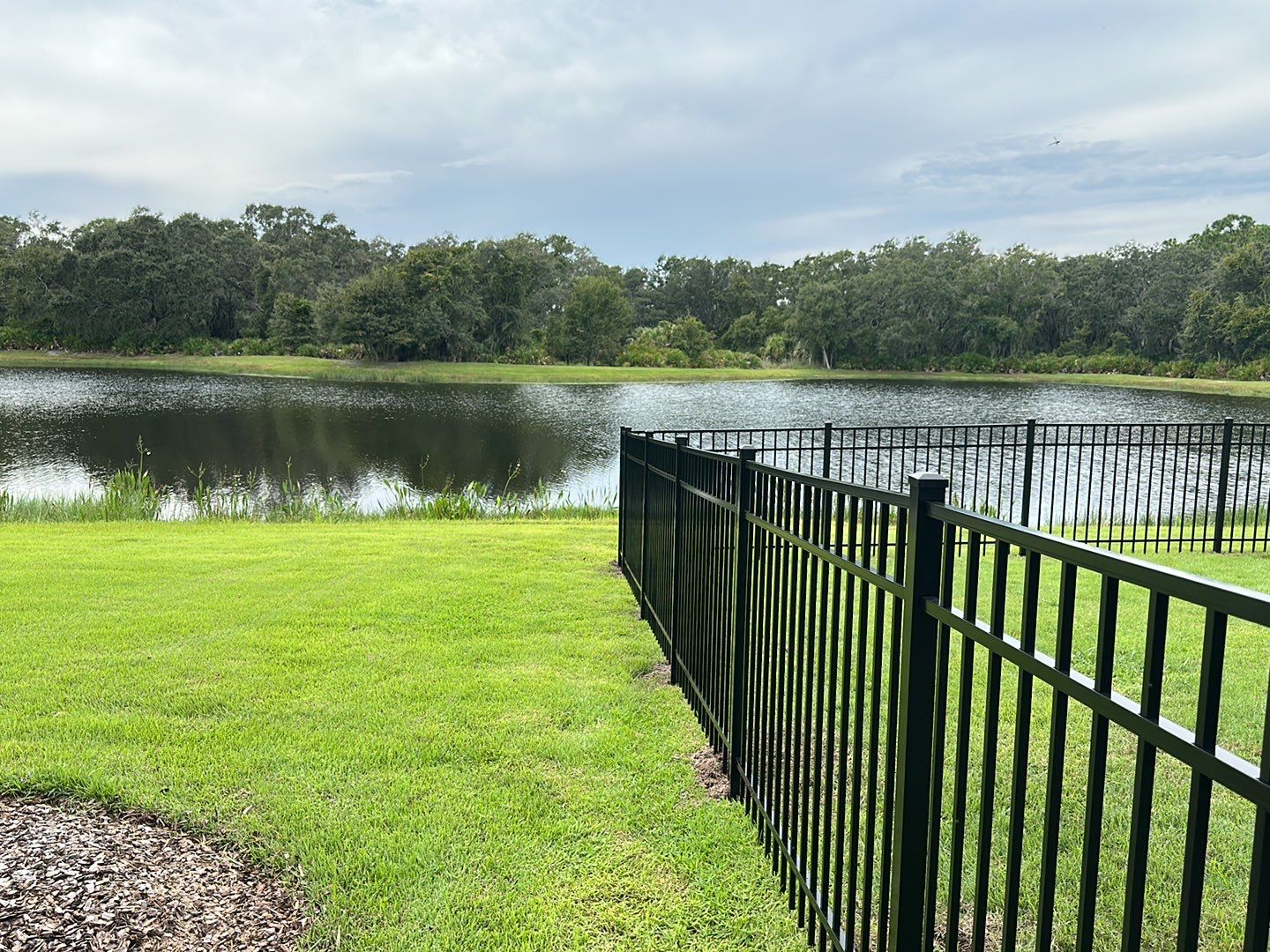 Aluminum Fence Installation using Black 3 Rail Aluminum Fence by Asap fence and gates, LLC