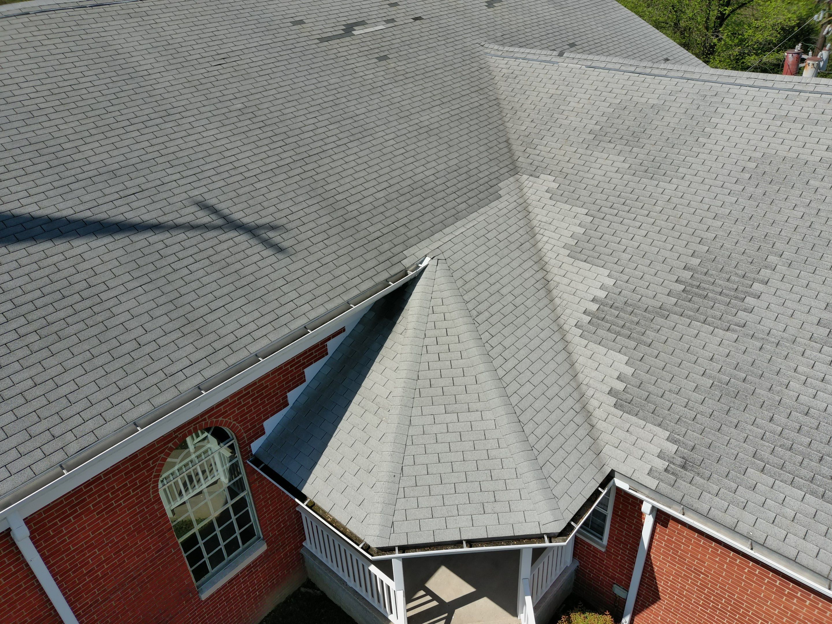 Commercial Roofing Installation using Performance Shingles by Mr. Roofer