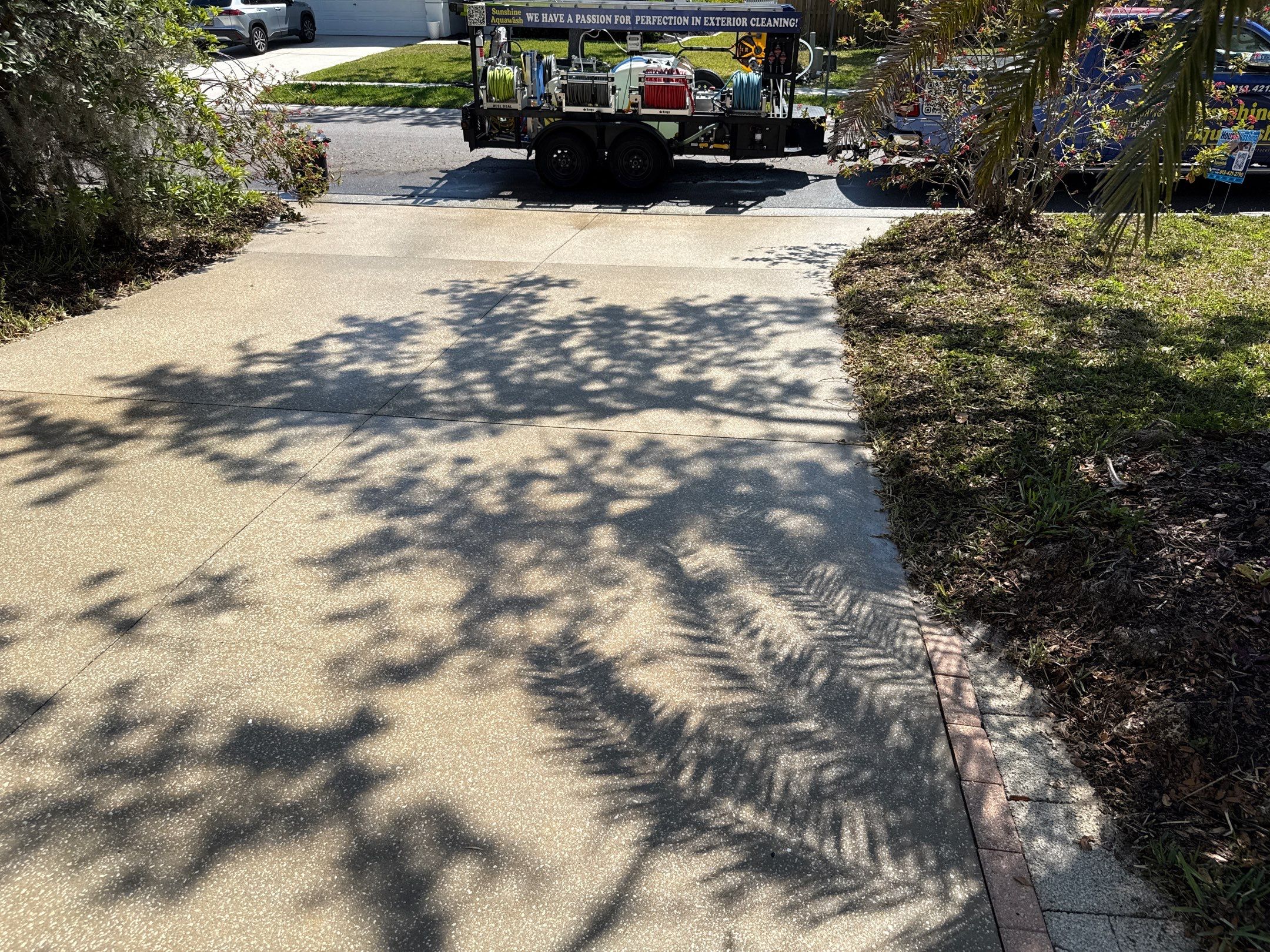 Concrete Driveway, Entryway & Street Curbing Cleaning | Foster’s Creek Community | Palmetto, FL by Sunshine AquaWash
