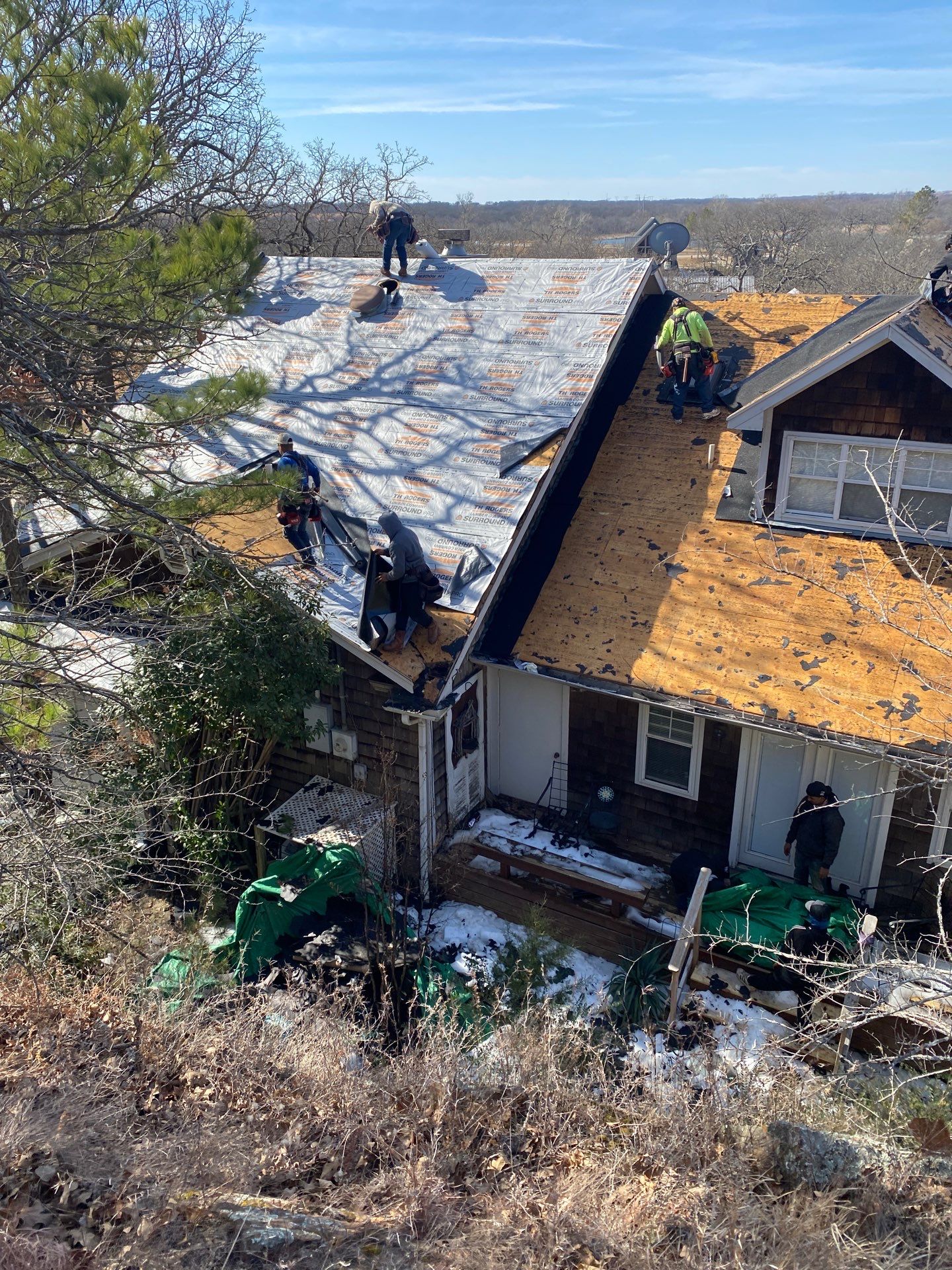 Roof Replacement on a private lake near Ardmore by BANA Roofing and Solar Supply