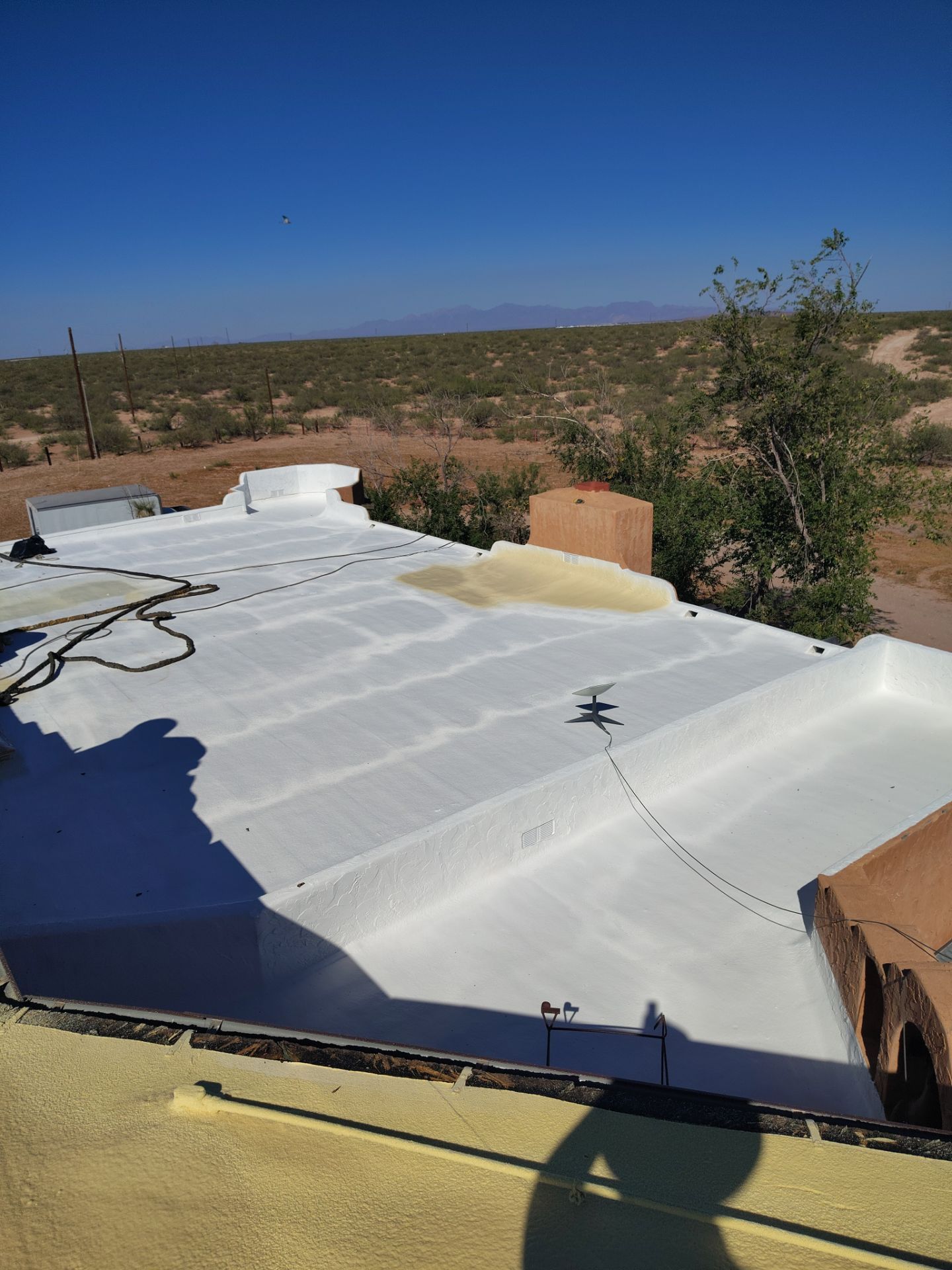 Residential roof application by SPF Services 