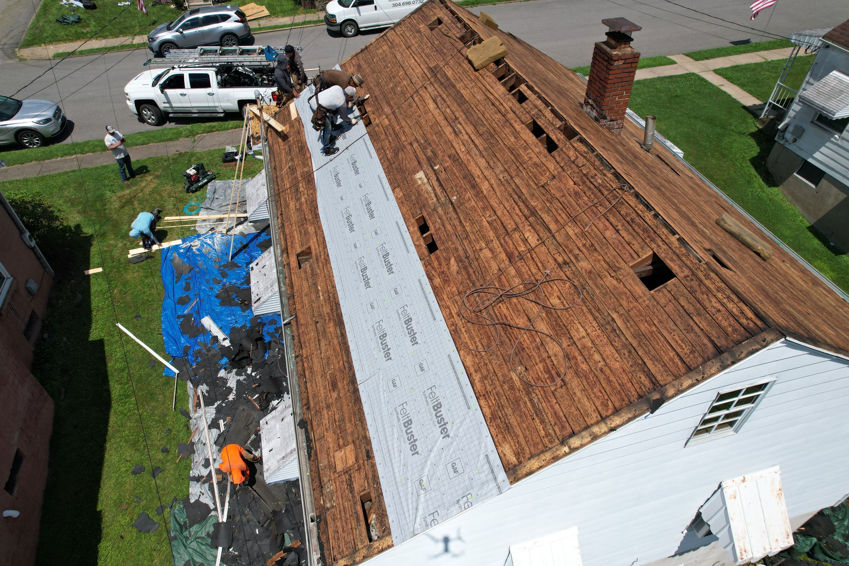 Residential Roofing Installation using GAF Timberline HDZ Williamsburg Slate by Rainstoppers Roofing