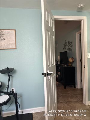 Denver Interior Bedroom Remodel Featuring New Paint and Tile Flooring