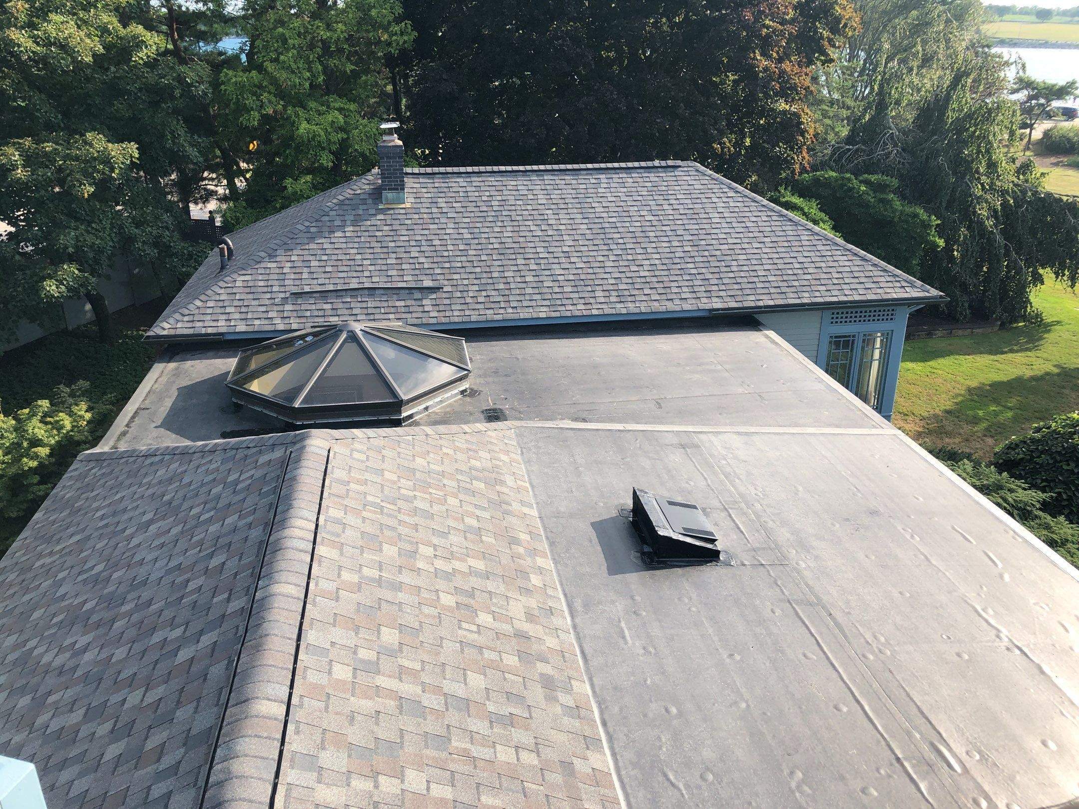 Driftwood Roofs by Pinnacle Roofing & Skylights