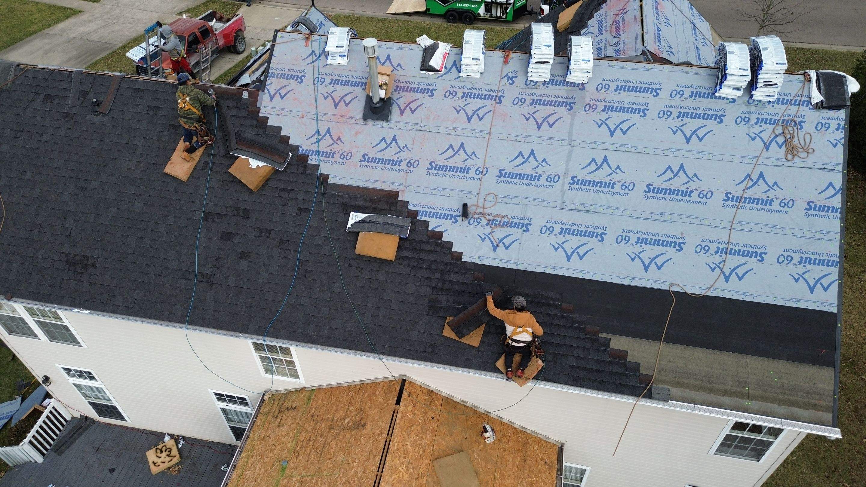 Walden Ponds - Pristine Black and Hydro Flo Gutter Guards by Tamlin Roofing