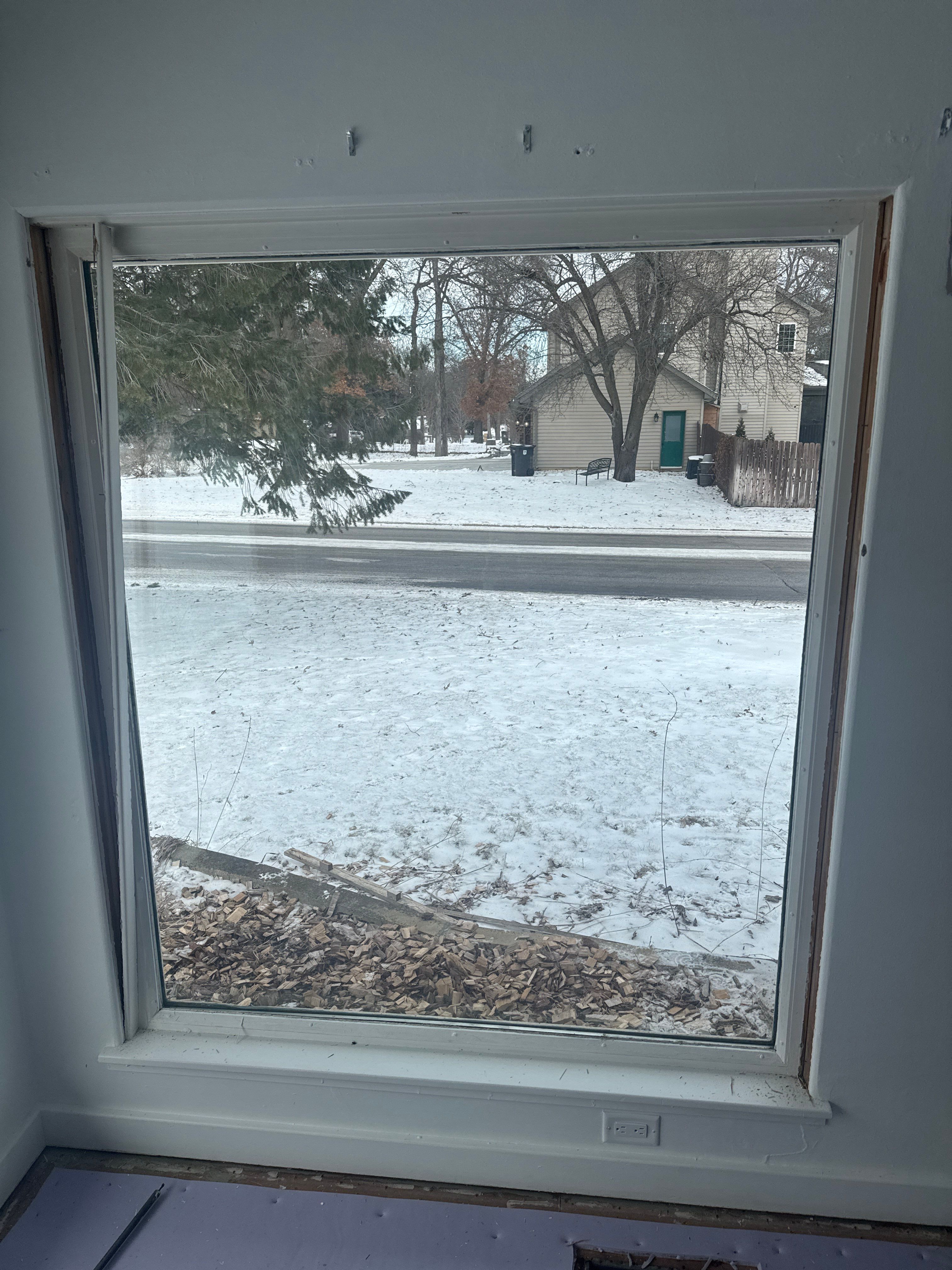 Black-Frame Pella Lifestyle Upgrade on a Partial Brick Home by United Windows and Siding LLC