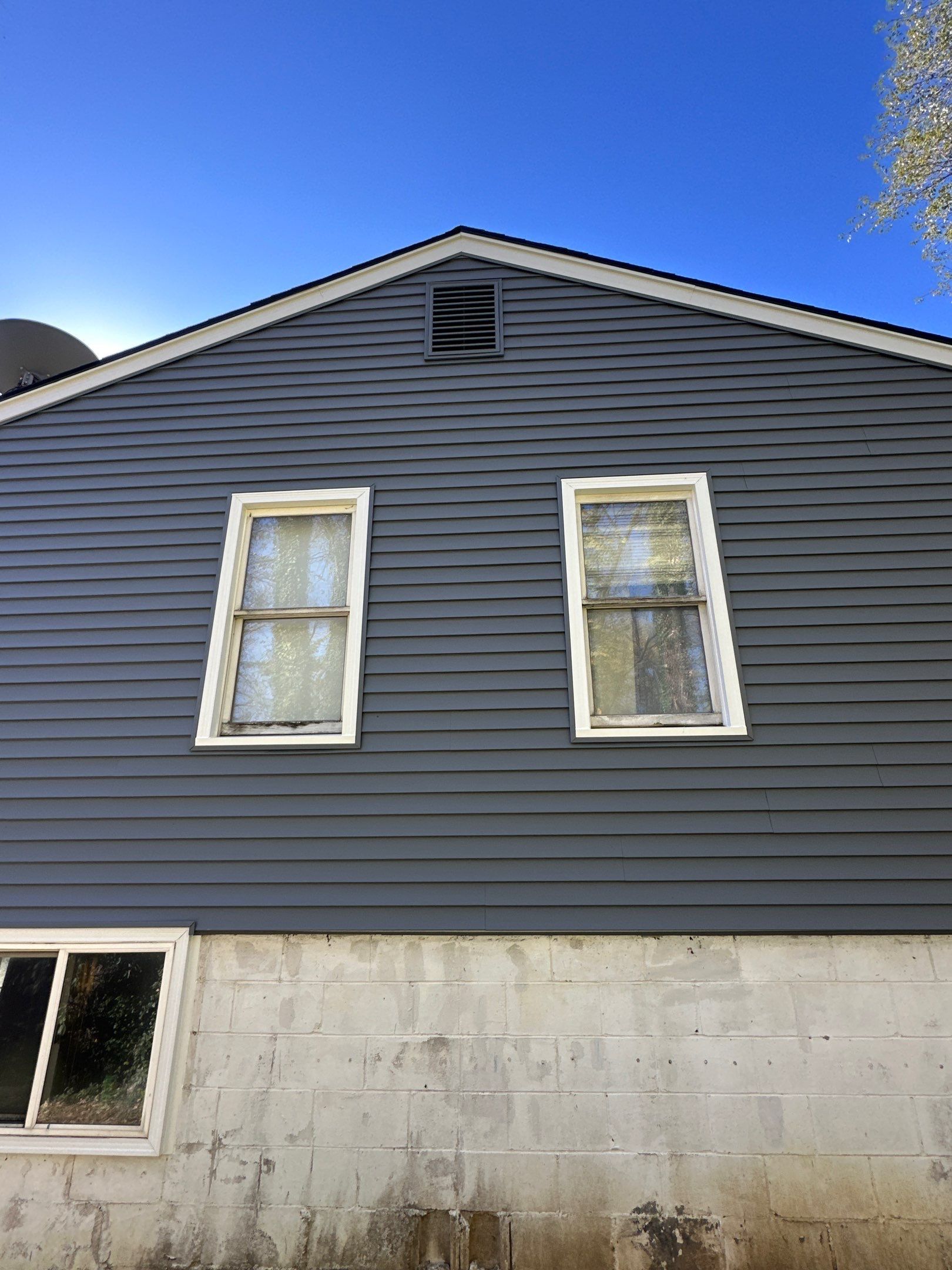 Feeling Blue in Weston Mo - Time for a Makeover by EEC Windows, Siding & Roofing