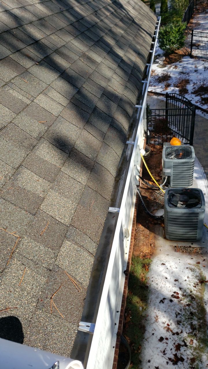 Gutter Cleaning using water by Power Wash Masters LLC