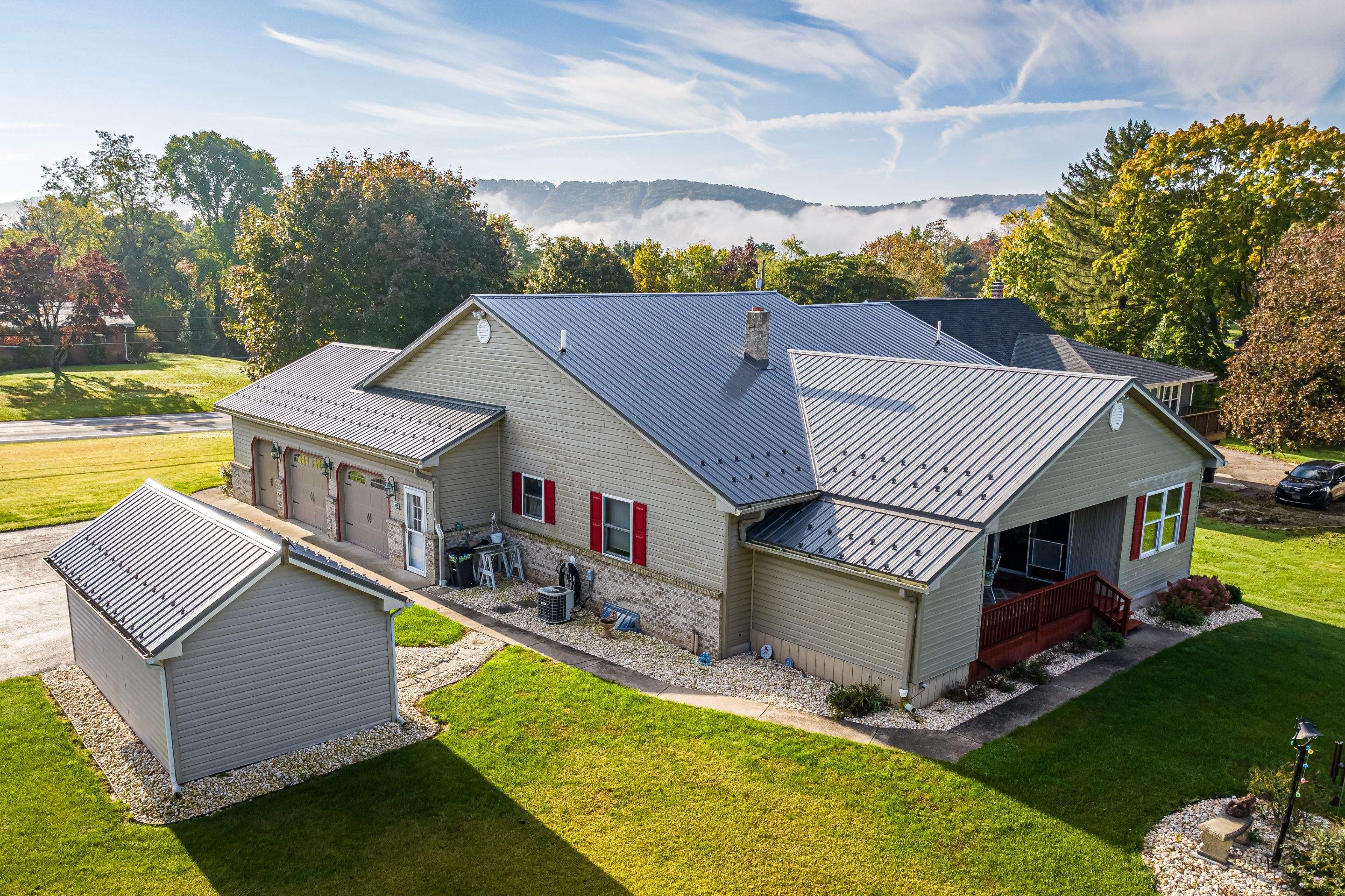 Metal roof-charcoal by Esh Builders