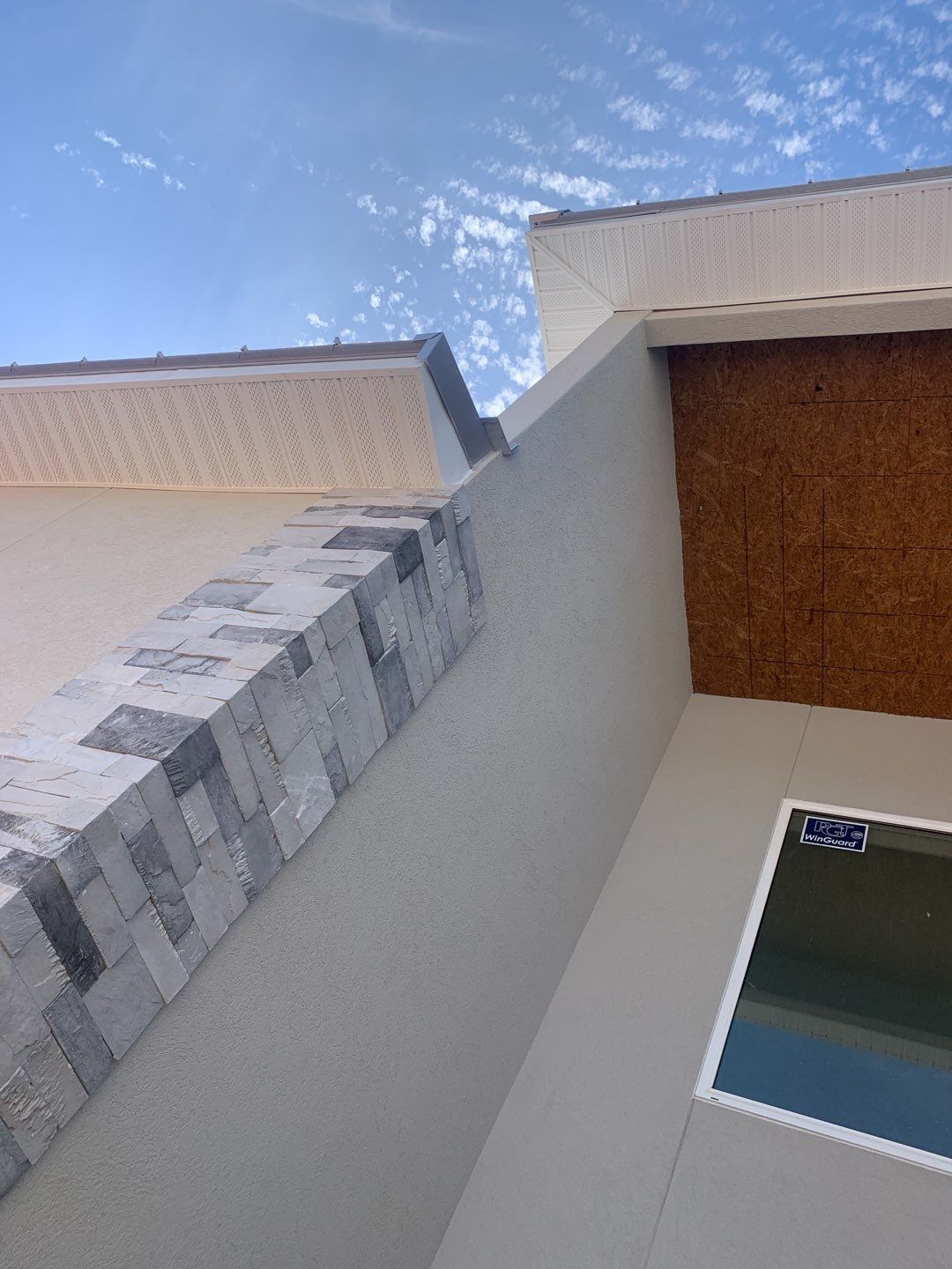 Soffit and Fascia Installation using White Vinyl Soffit in Pensacola FL by Gutter Professors