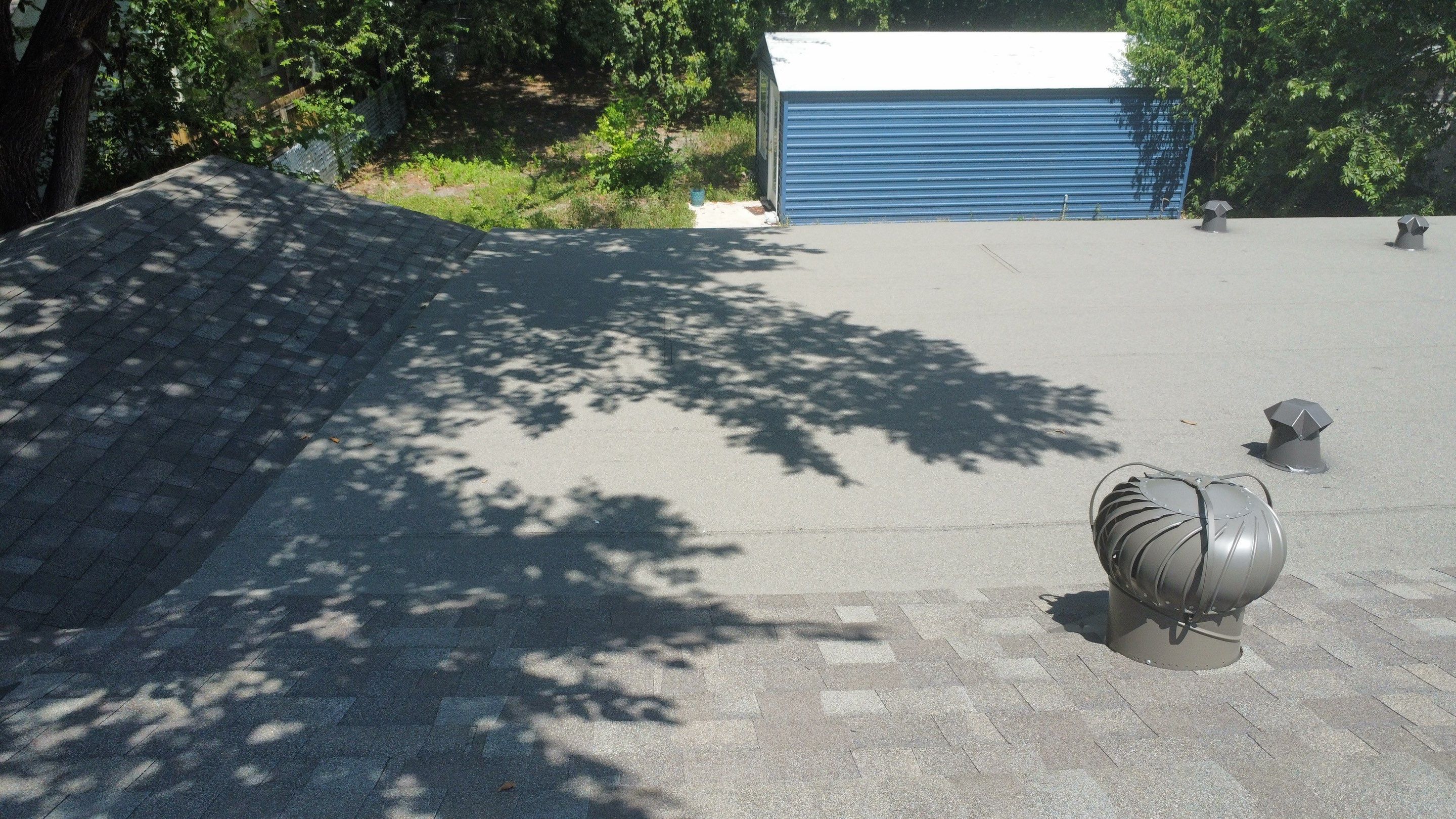 Mixed Roof System ā Oakridge Driftwood + Flat Roof Section | Austin, TX by Kstylez Roofing & Construction