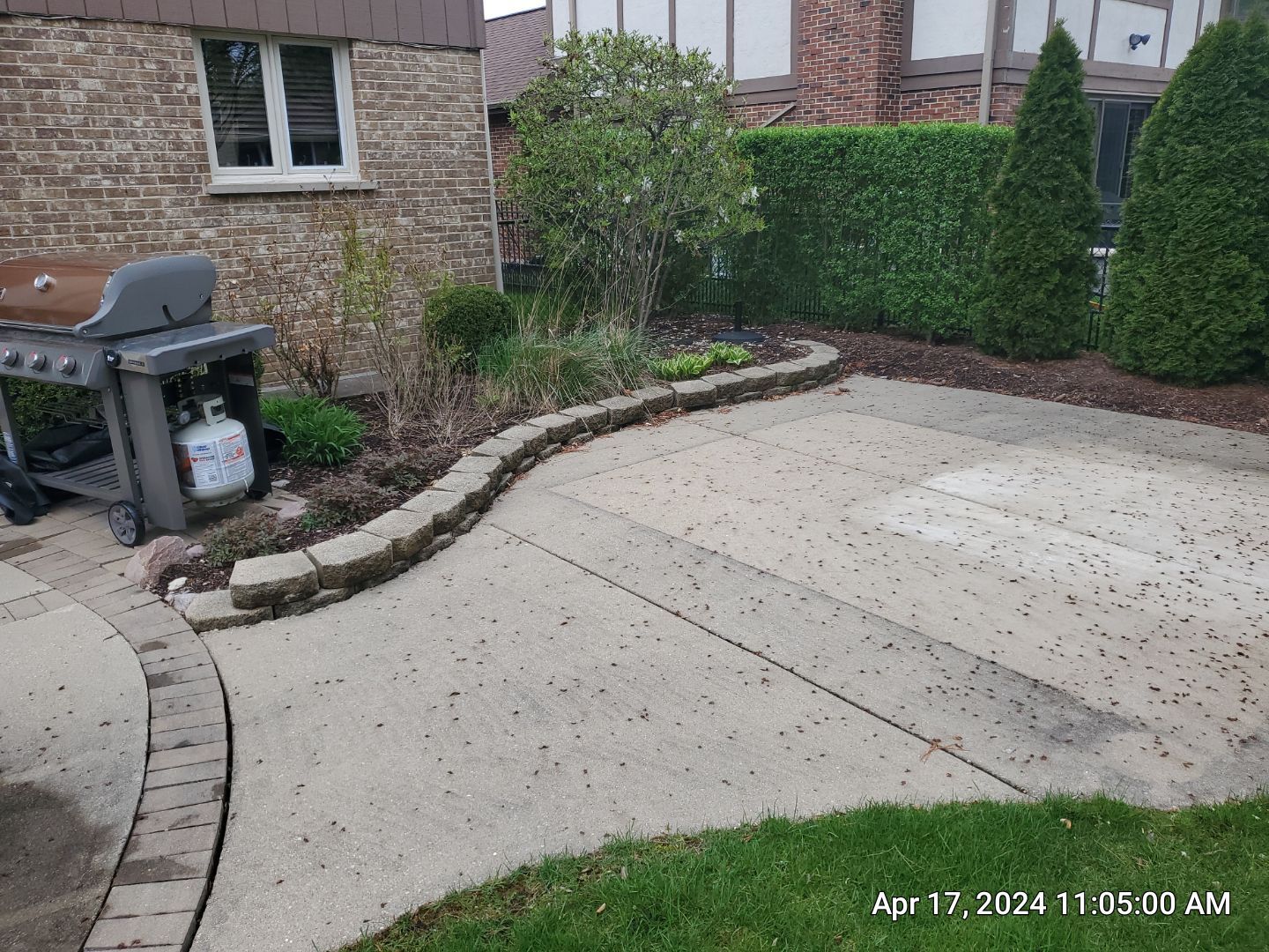concrete patio and driveway cleaning by Northern Power Washing LLC.