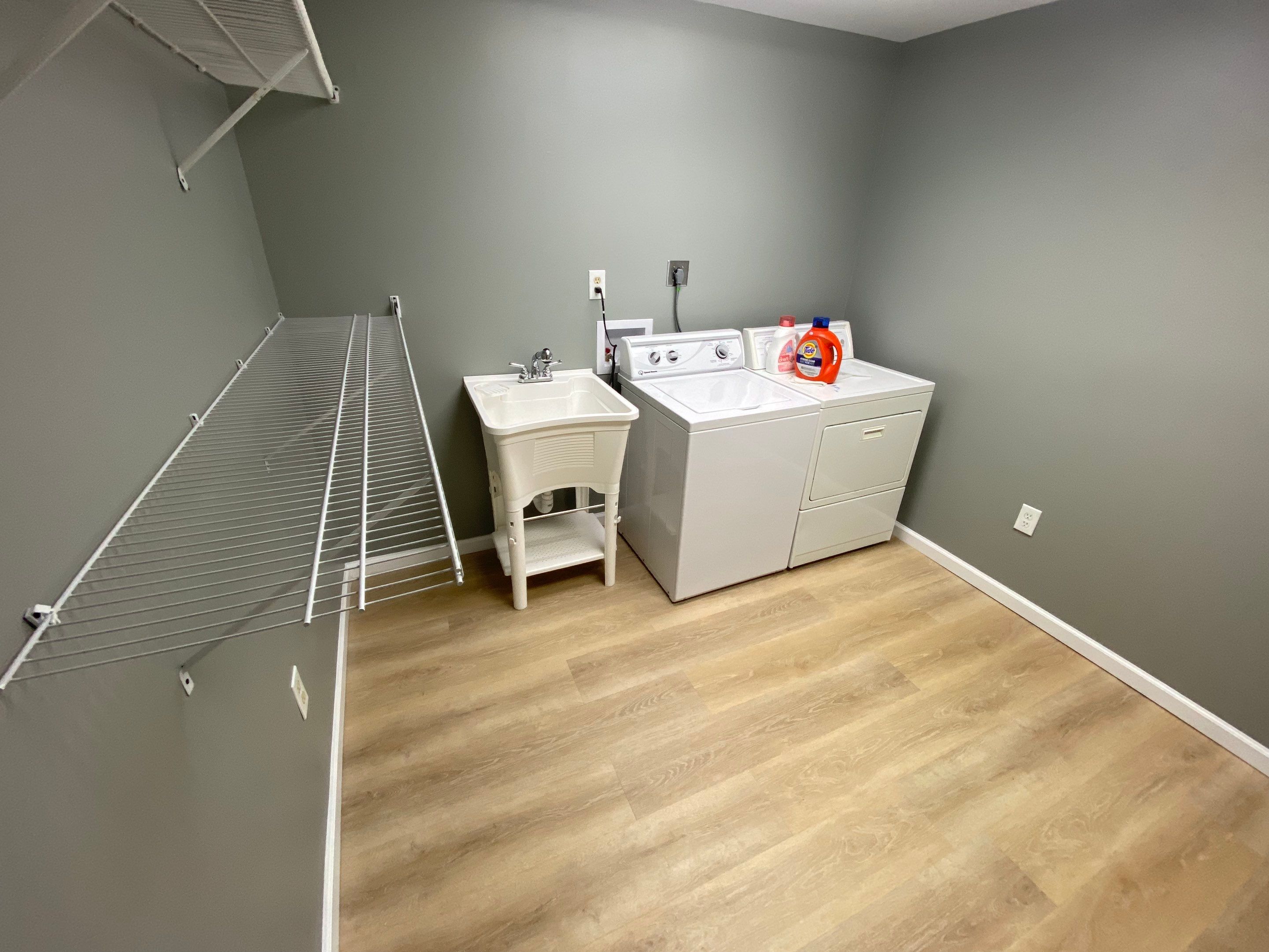 Laundry Room Redmodel using Lifeproof Luxury Vinyl Plank Flooring by The Smet Companies, LLC
