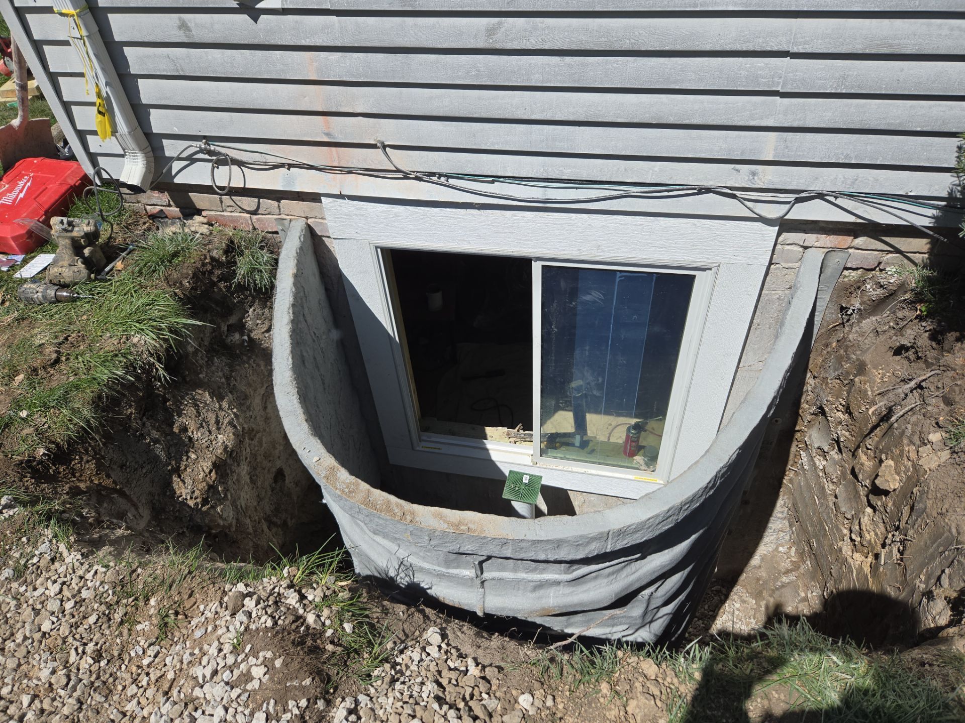 Egress Window Installation with a Premier Basement Egress Window Kit by Toledo Basement Repair