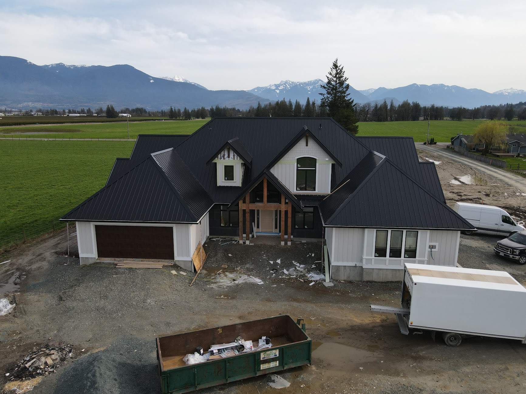 Residential Roofing Installation using 12" Prolok metal  by Top Notch Roofing Inc
