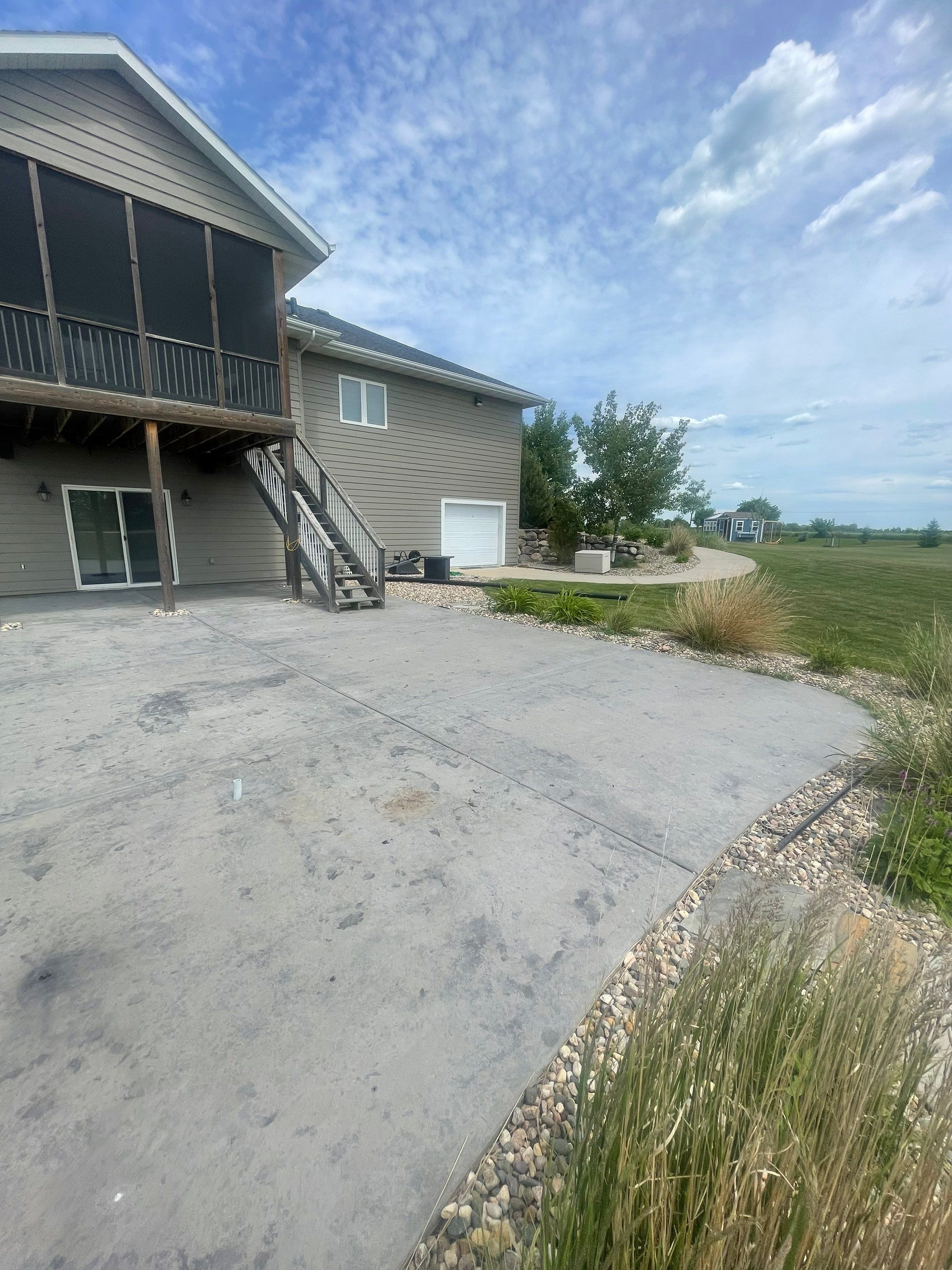 Concrete Patio Restoration and Installation in Sioux Falls by Select Painting, Coatings & Garage Cabinets