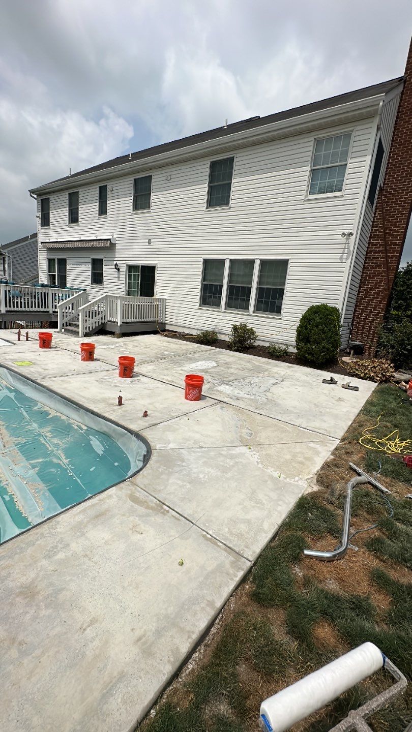 Pool Deck + Driveway + Garage Project in Venetia by Floors in a Day, Inc