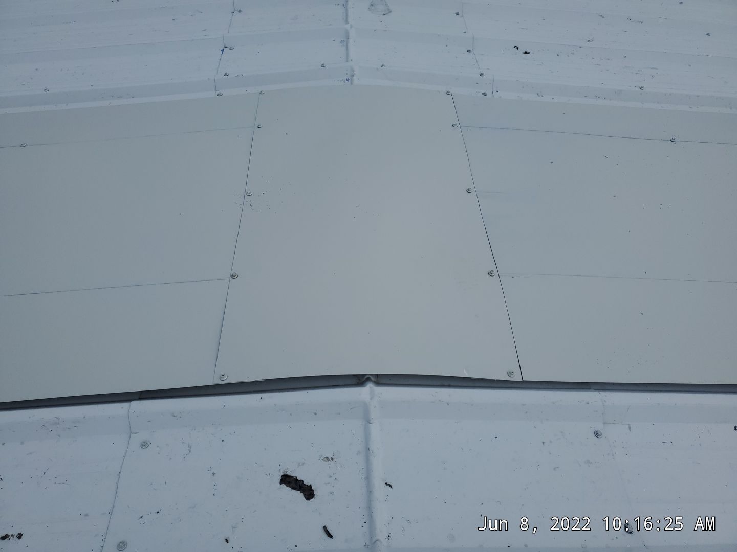 Commercial Roofing Installation using Aluminum Roofing panels by Hostetler Roofing