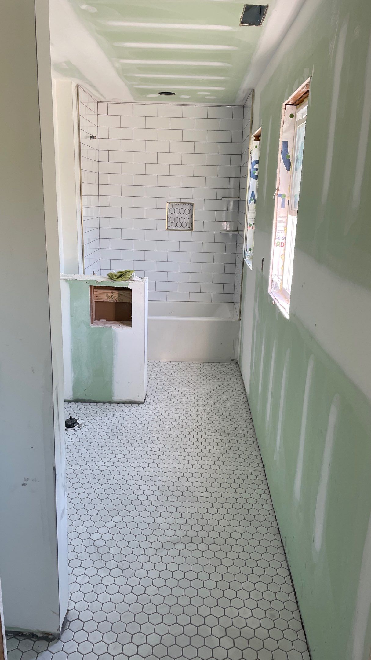 Remodeled Home with new tile floors, Showers and Refinished Oak Floors with stain and Waterbased Finish by Footprints Floors of Coastal Carolina