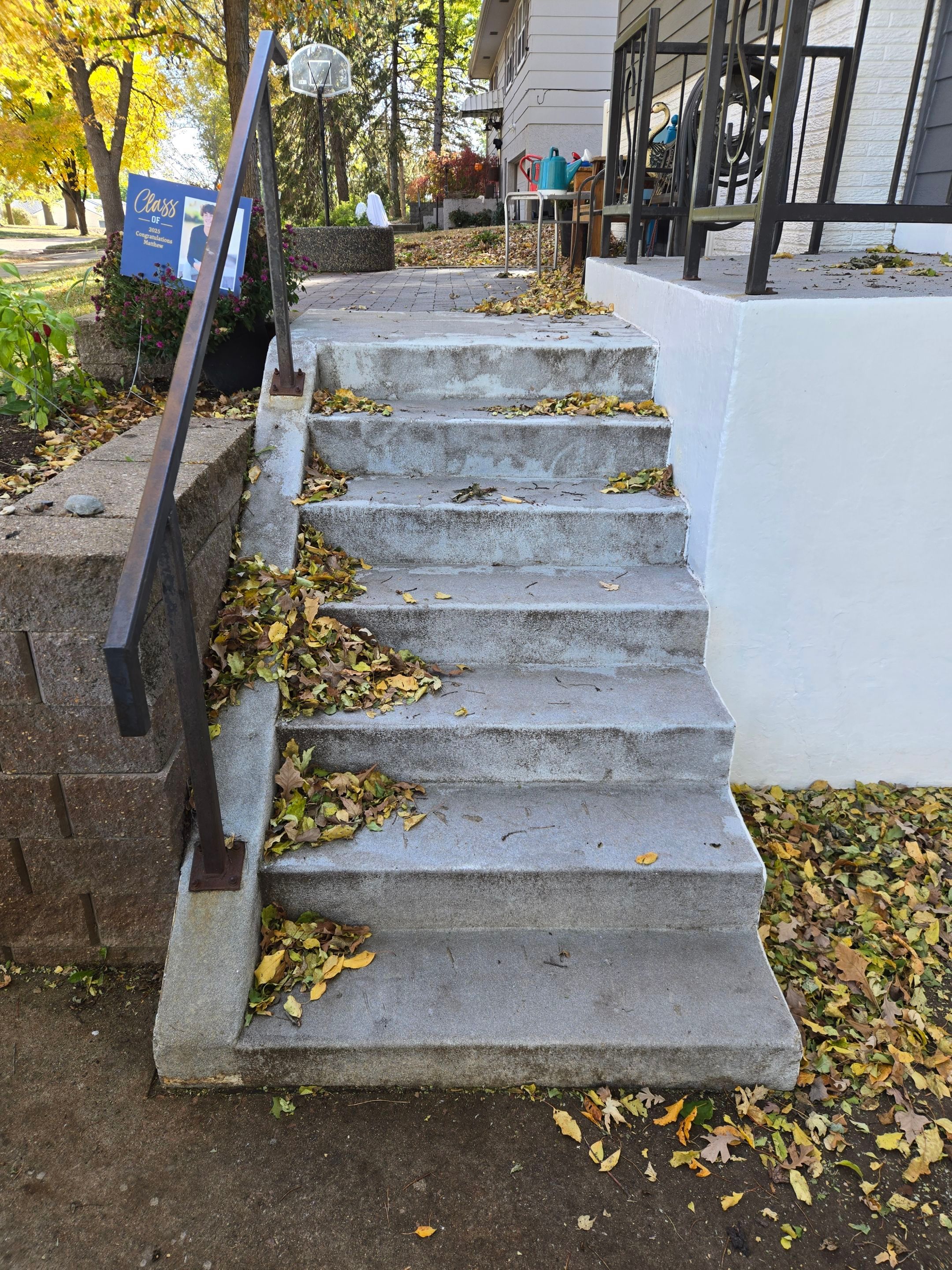Grey Polyaspartic Porch and Stair Resurfacing in Sioux Falls by Select Painting, Coatings & Garage Cabinets